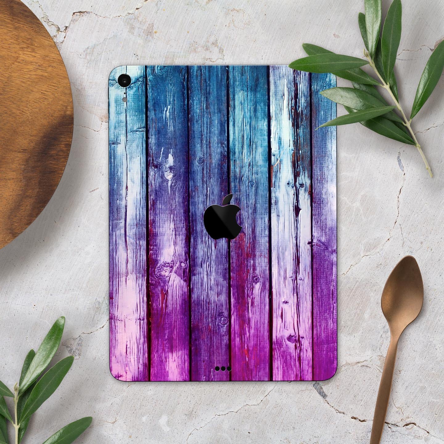 Pink and blue dyed wood skin decal for Apple iPad Pro, showcasing vibrant colors and a sleek design.