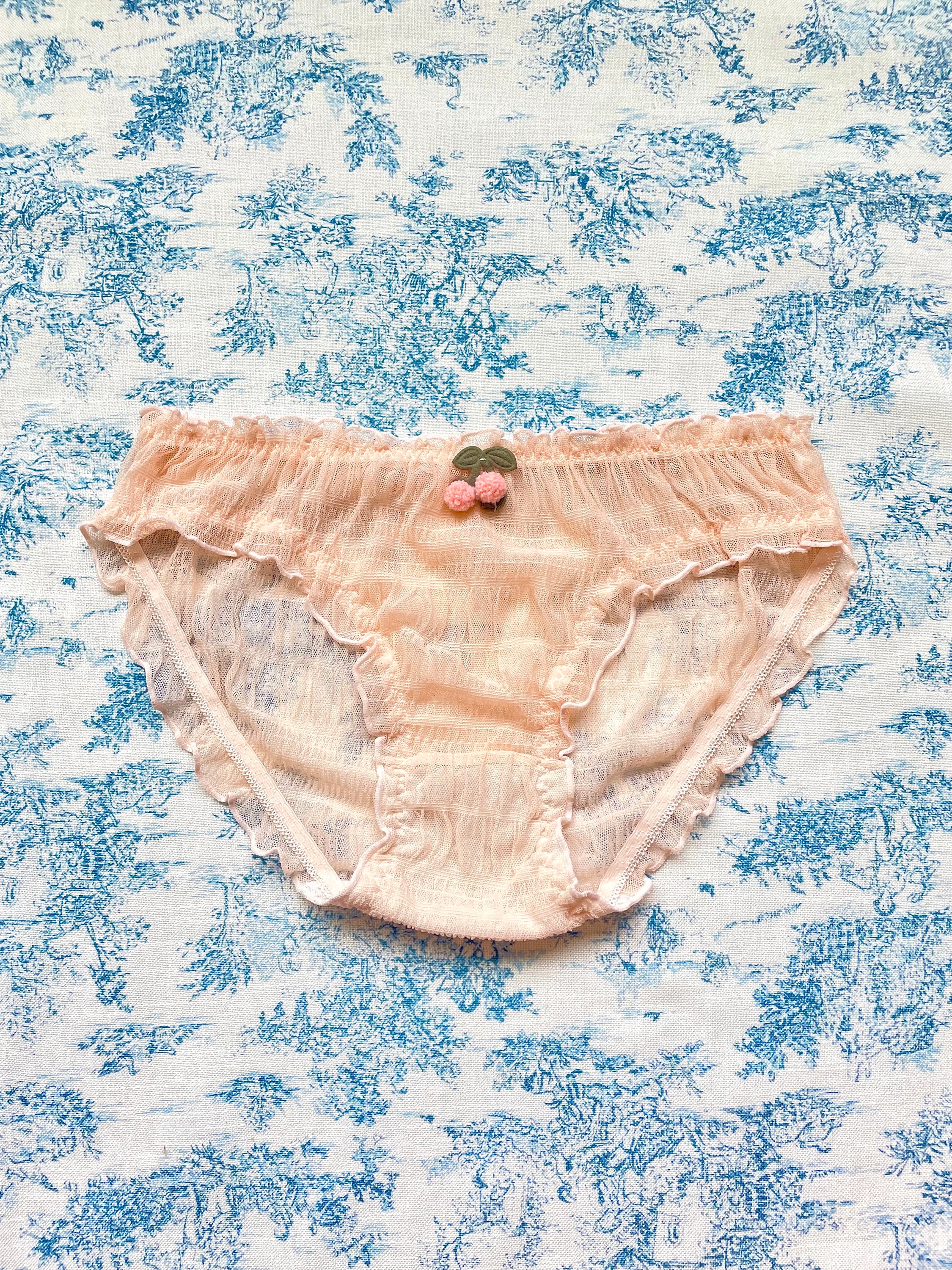 Pink Cherry Panty featuring delicate cherry details and a charming lettuce edge, made from luxurious cotton.