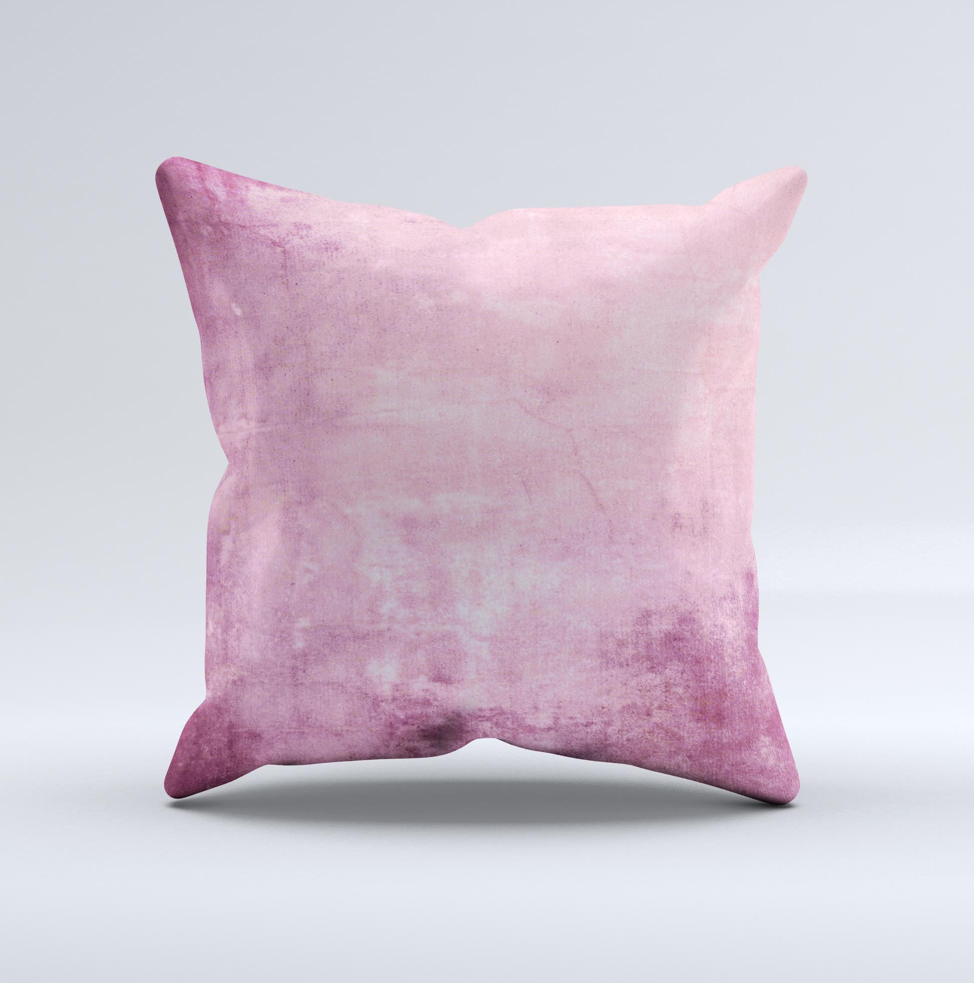 Pink grungy surface texture decorative throw pillow with unique handcrafted design, showcasing vibrant colors and soft fabric.