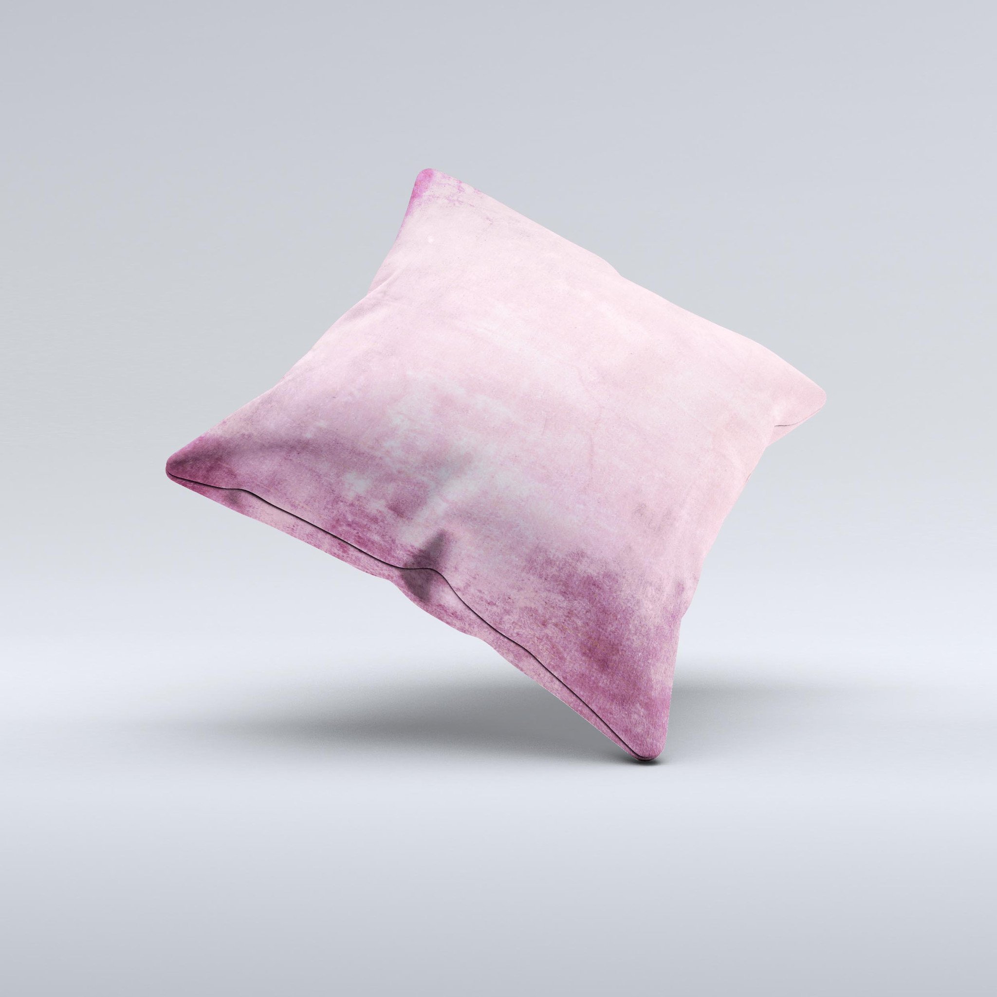 Pink grungy surface texture decorative throw pillow with unique handcrafted design, showcasing vibrant colors and soft fabric.