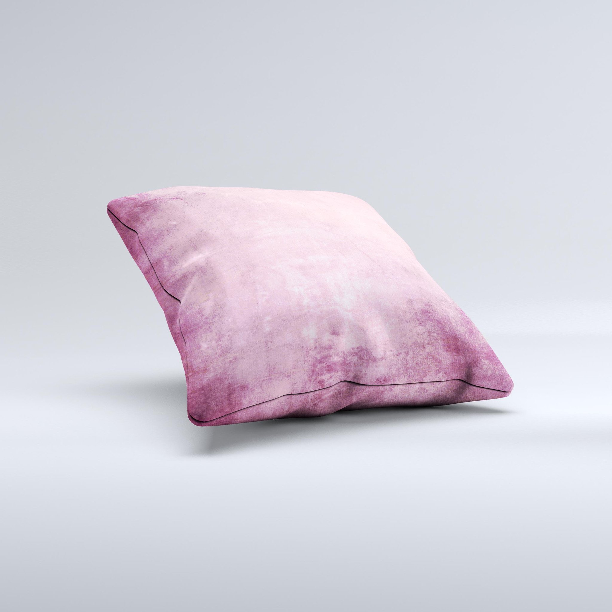 Pink grungy surface texture decorative throw pillow with unique handcrafted design, showcasing vibrant colors and soft fabric.