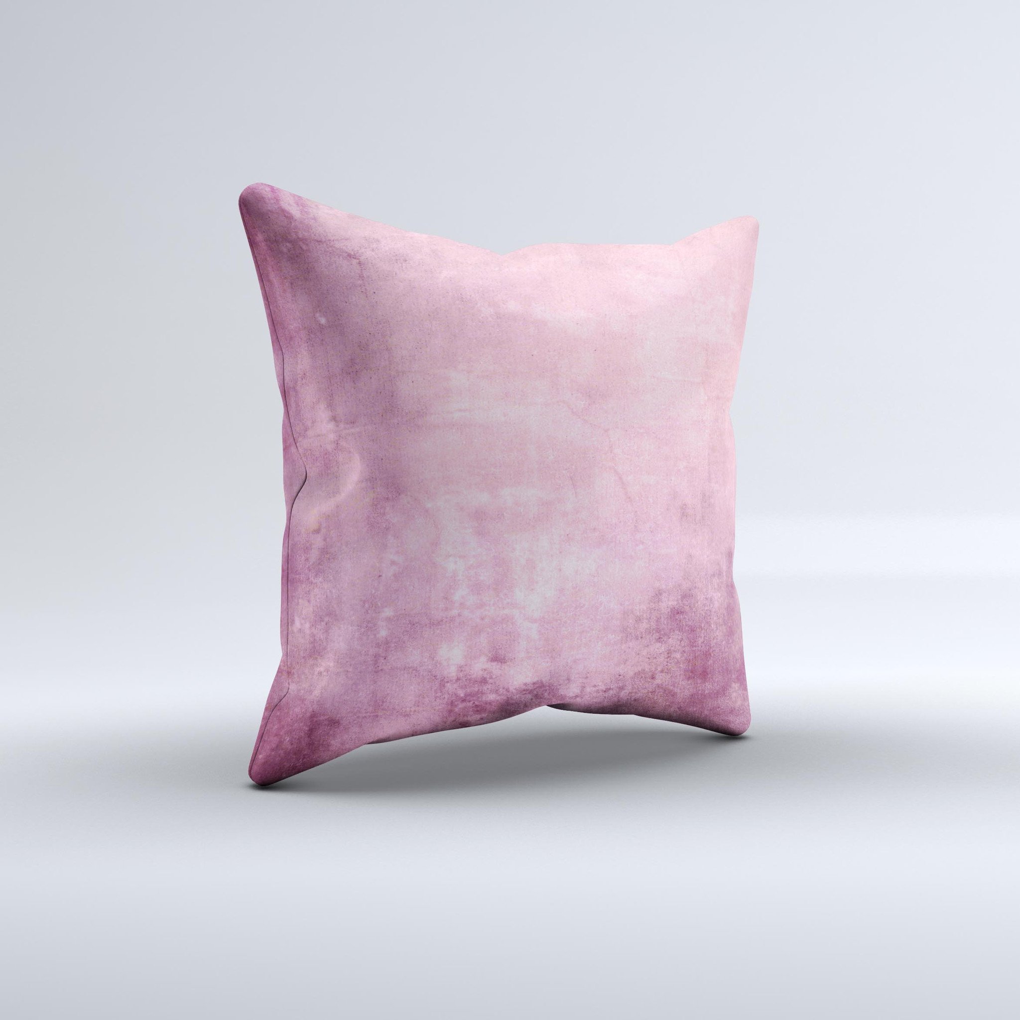 Pink grungy surface texture decorative throw pillow with unique handcrafted design, showcasing vibrant colors and soft fabric.