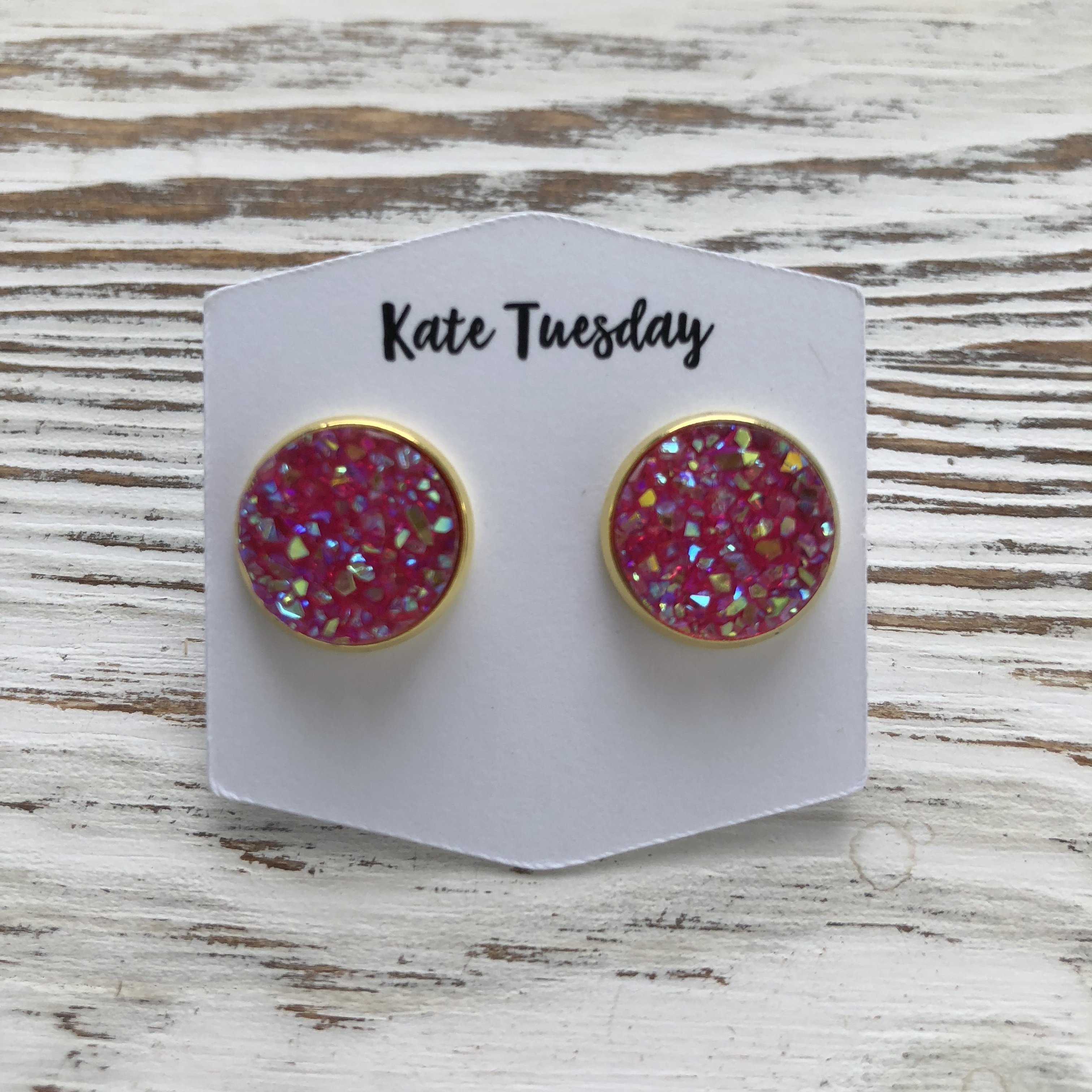 A pair of stunning Pink Sparkle Druzy Earrings featuring 12mm stones on nickel-free backs, available in silver, bronze, gold, and rose gold settings.