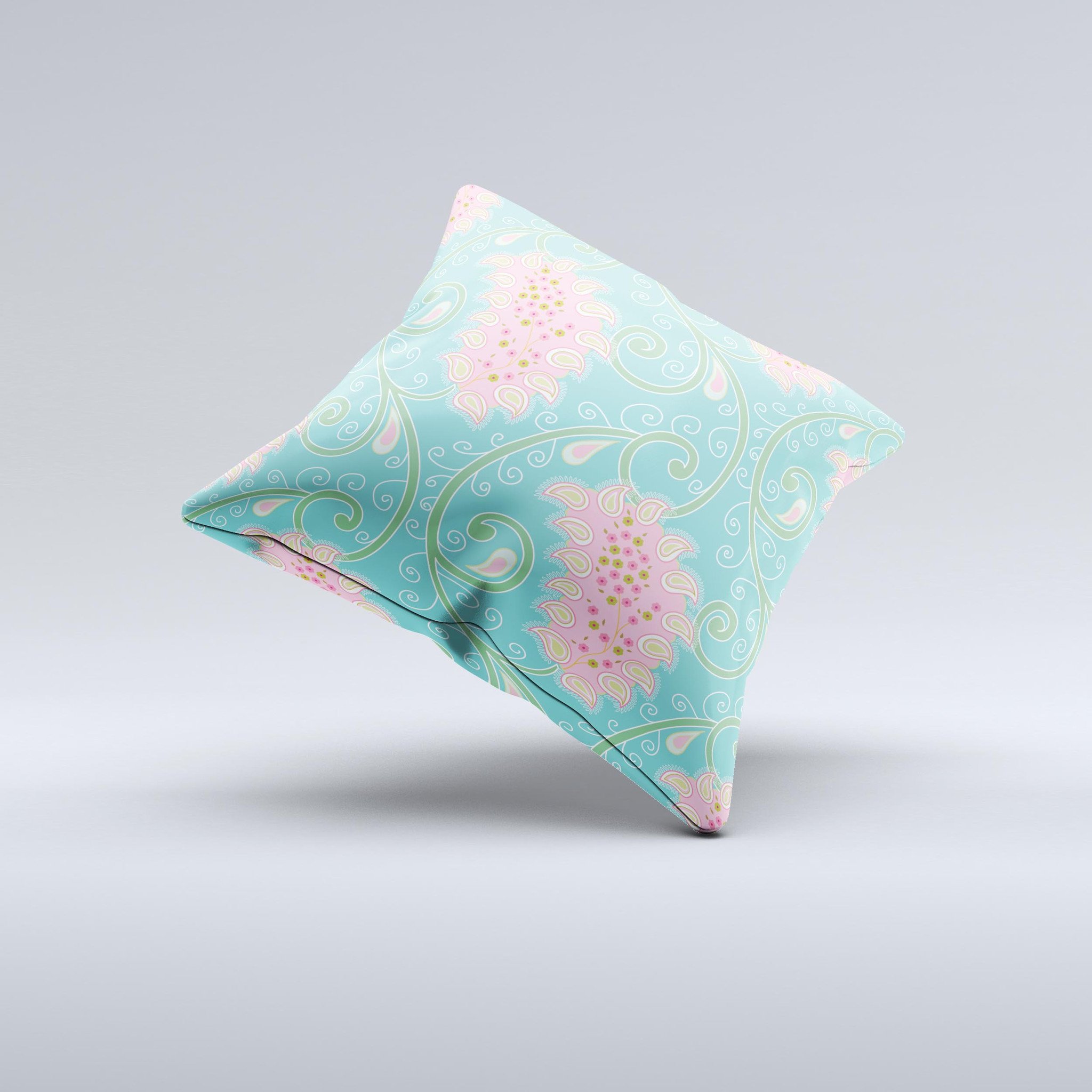 Pink and teal decorative throw pillow featuring a paisley design, handcrafted in Virginia with high thread count fabric and plush polyester filling.