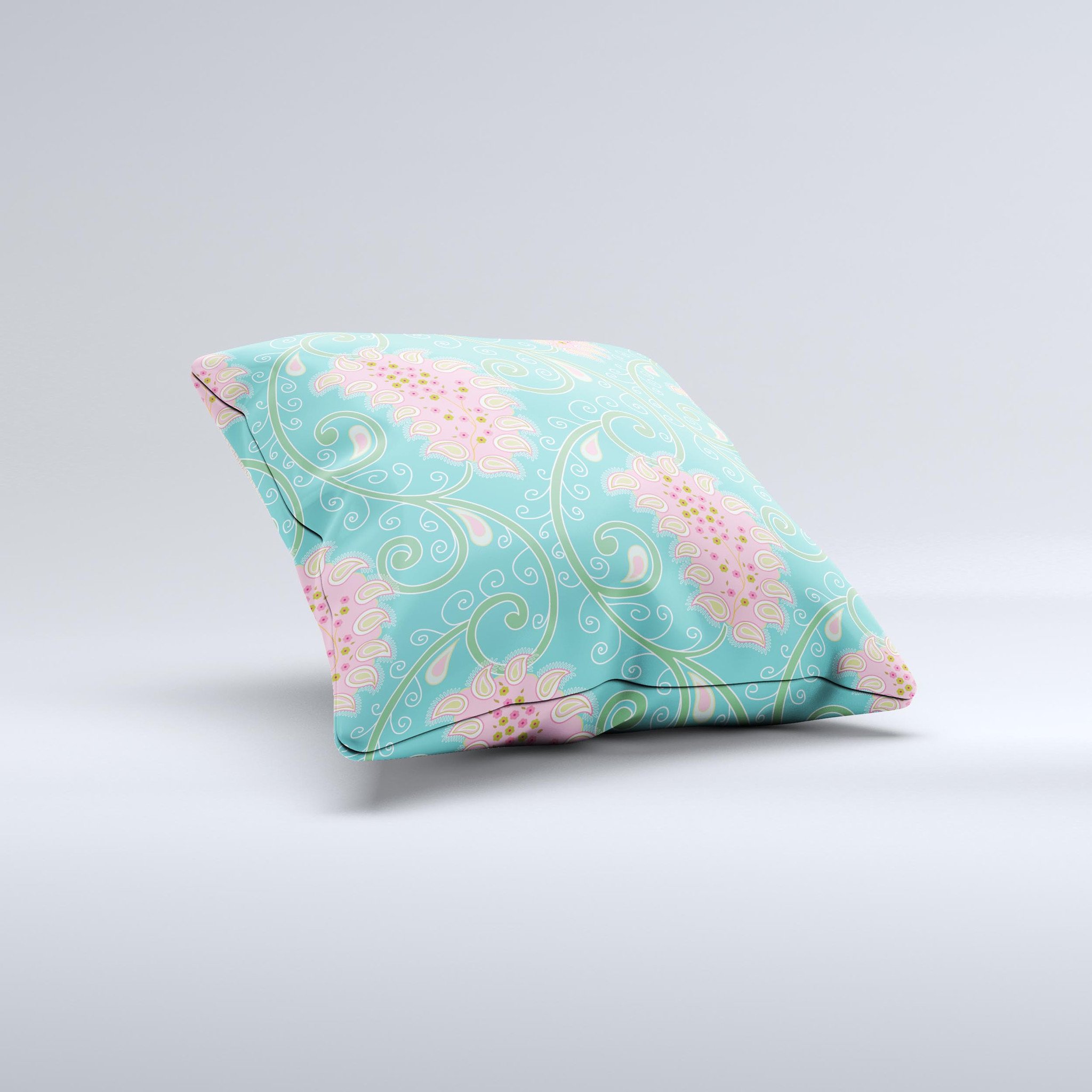 Pink and teal decorative throw pillow featuring a paisley design, handcrafted in Virginia with high thread count fabric and plush polyester filling.