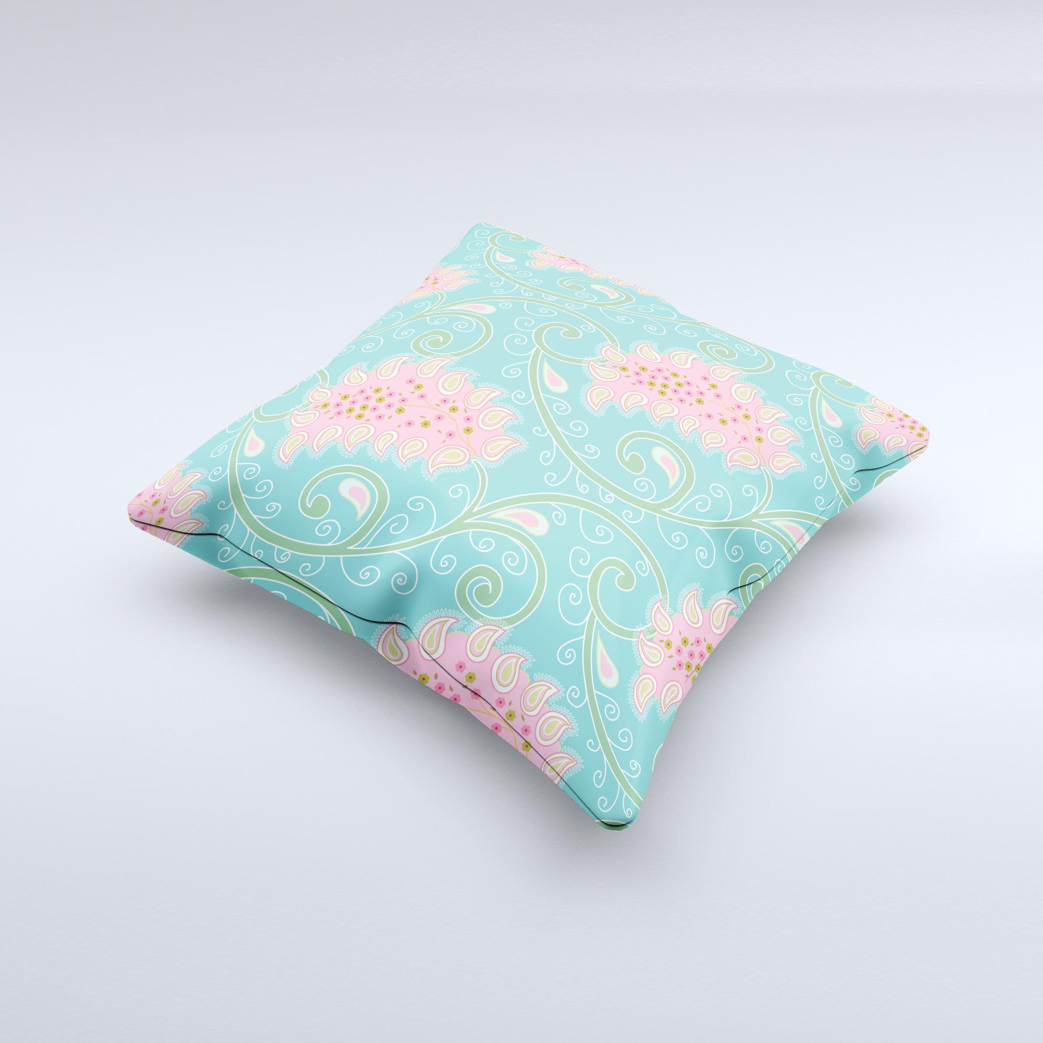 Pink and teal decorative throw pillow featuring a paisley design, handcrafted in Virginia with high thread count fabric and plush polyester filling.