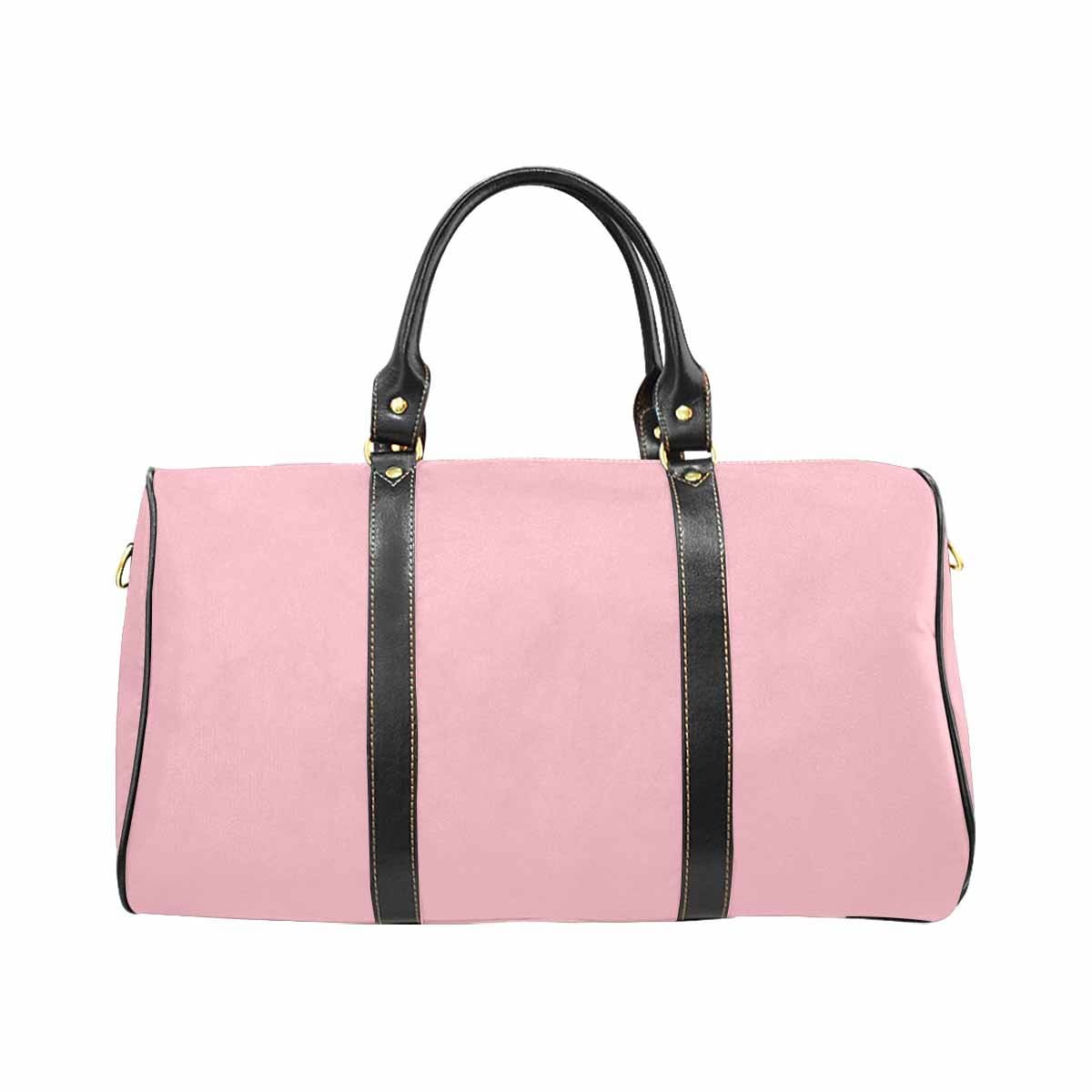 Stylish pink travel bag with adjustable strap and durable design, perfect for carry-on luggage.