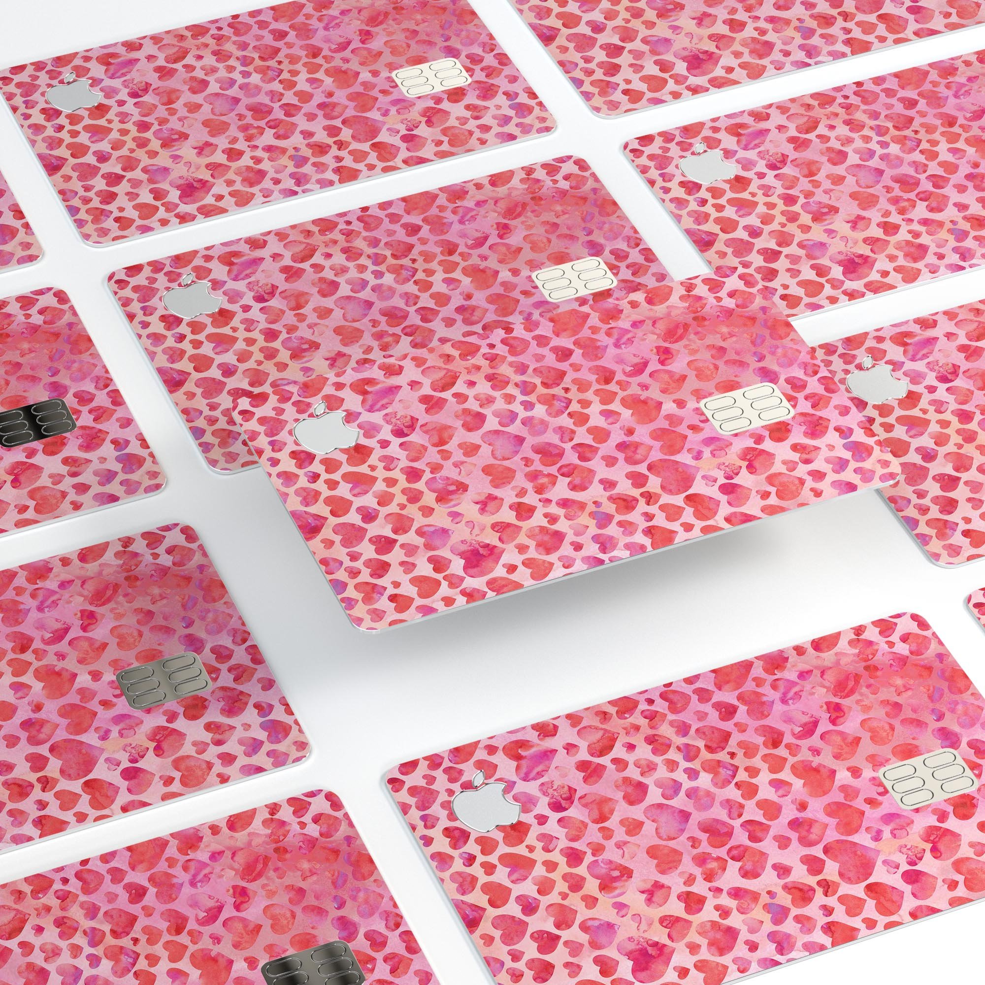 Pink Watercolor Hearts V2 decal skin for Apple Card, showcasing vibrant heart designs on a protective vinyl surface.