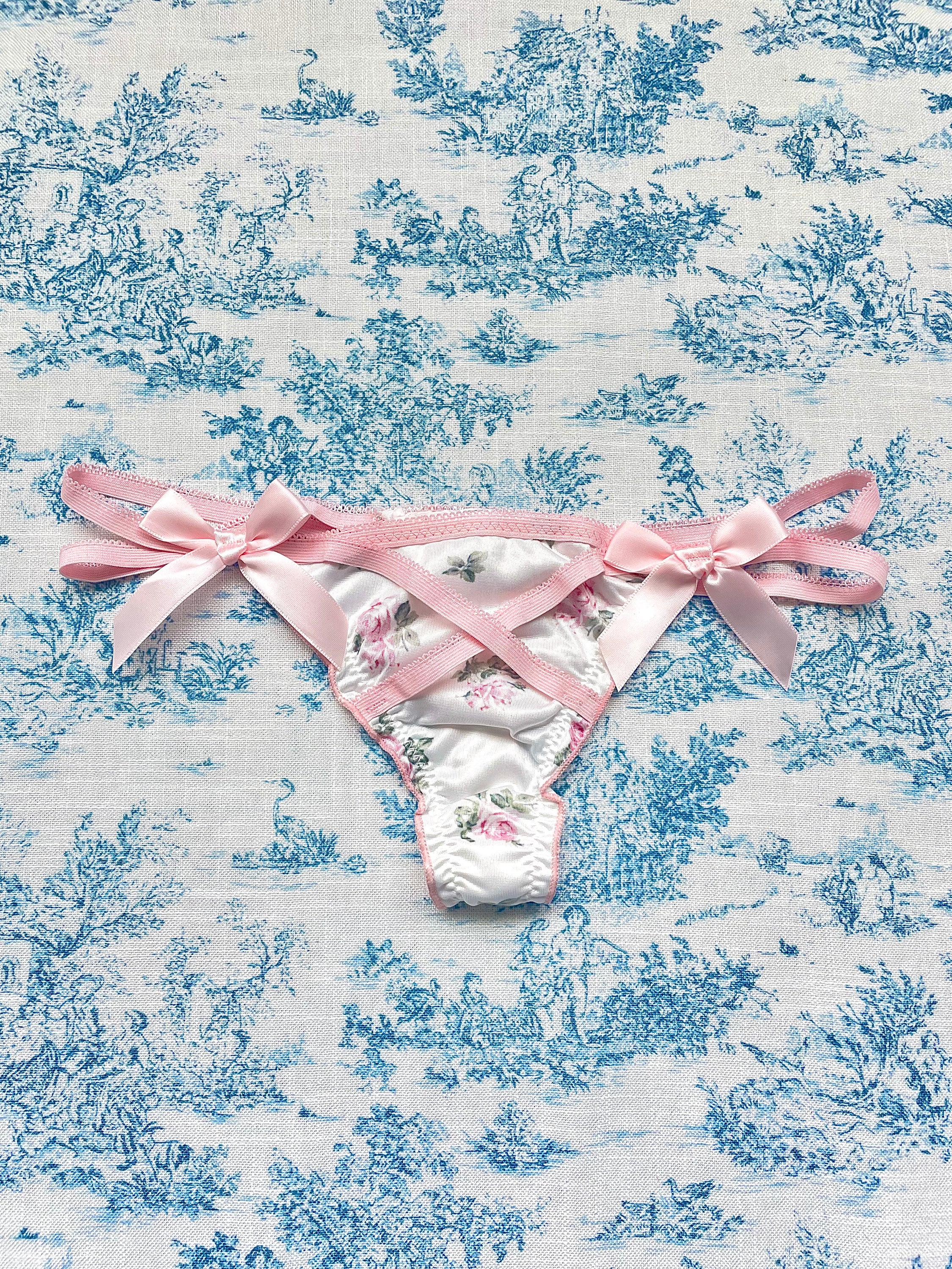 Pink & White Floral Bow Panty featuring satin floral print and delicate pink straps with three satin bows.