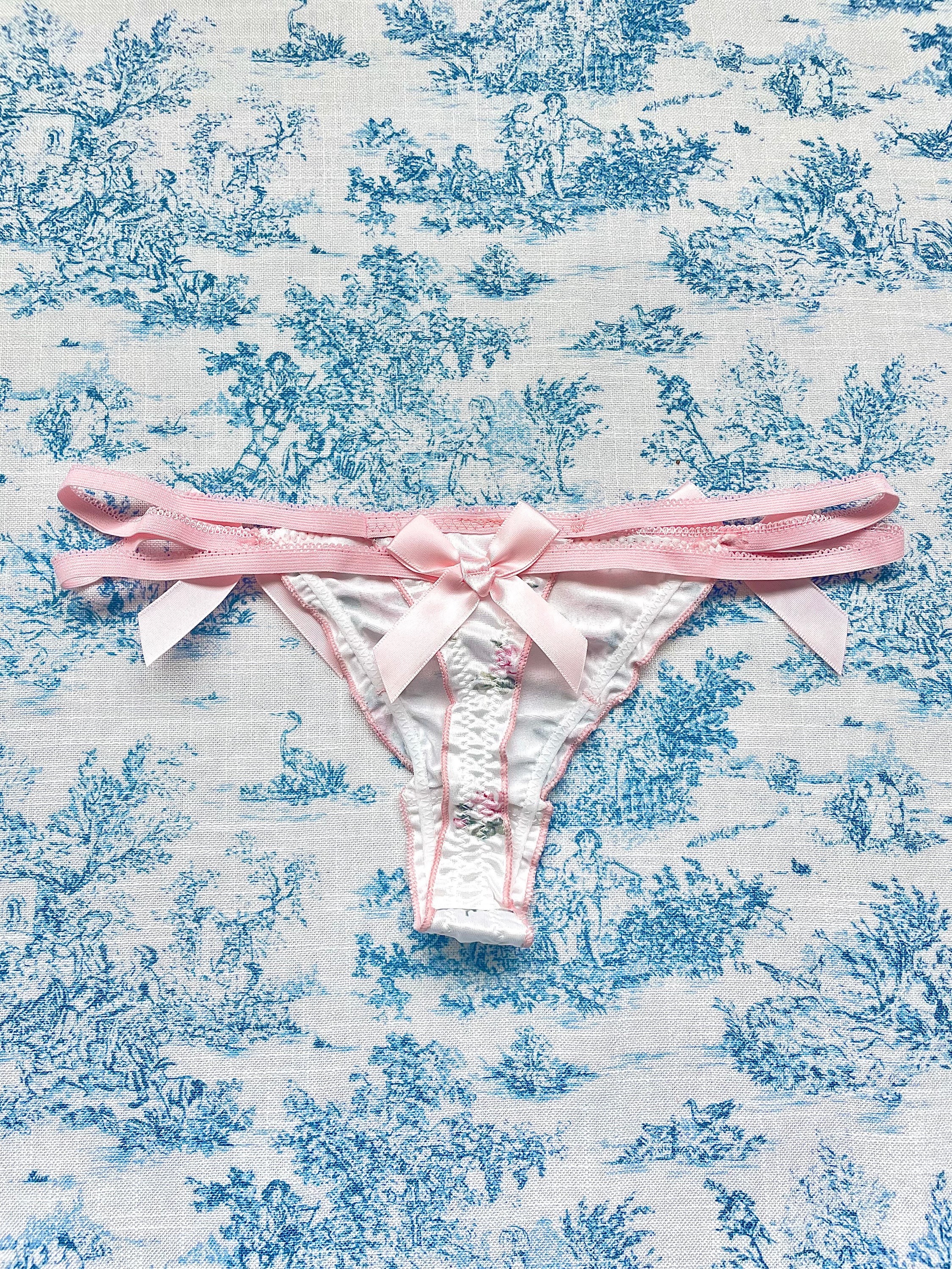 Pink & White Floral Bow Panty featuring satin floral print and delicate pink straps with three satin bows.