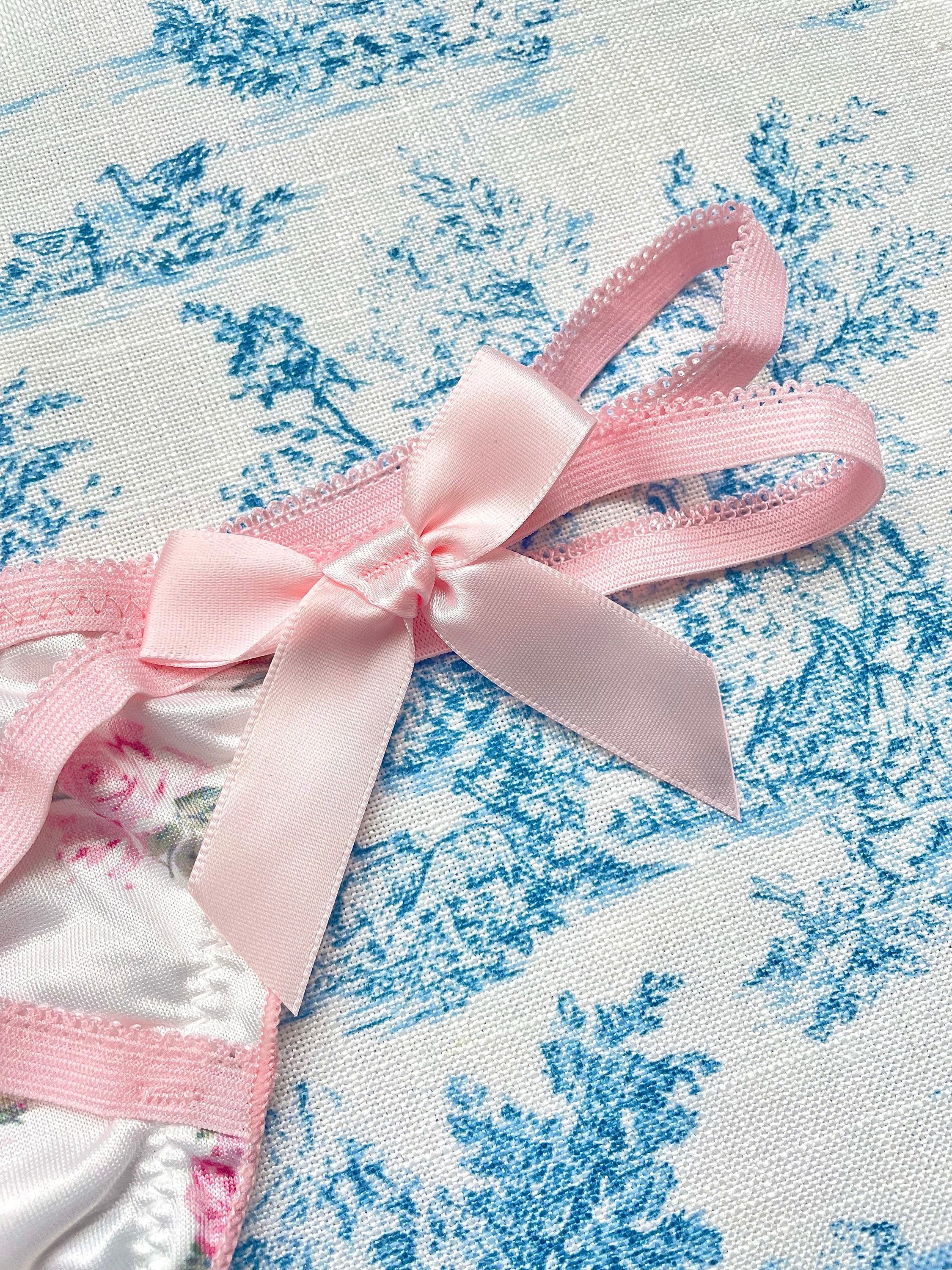 Pink & White Floral Bow Panty featuring satin floral print and delicate pink straps with three satin bows.