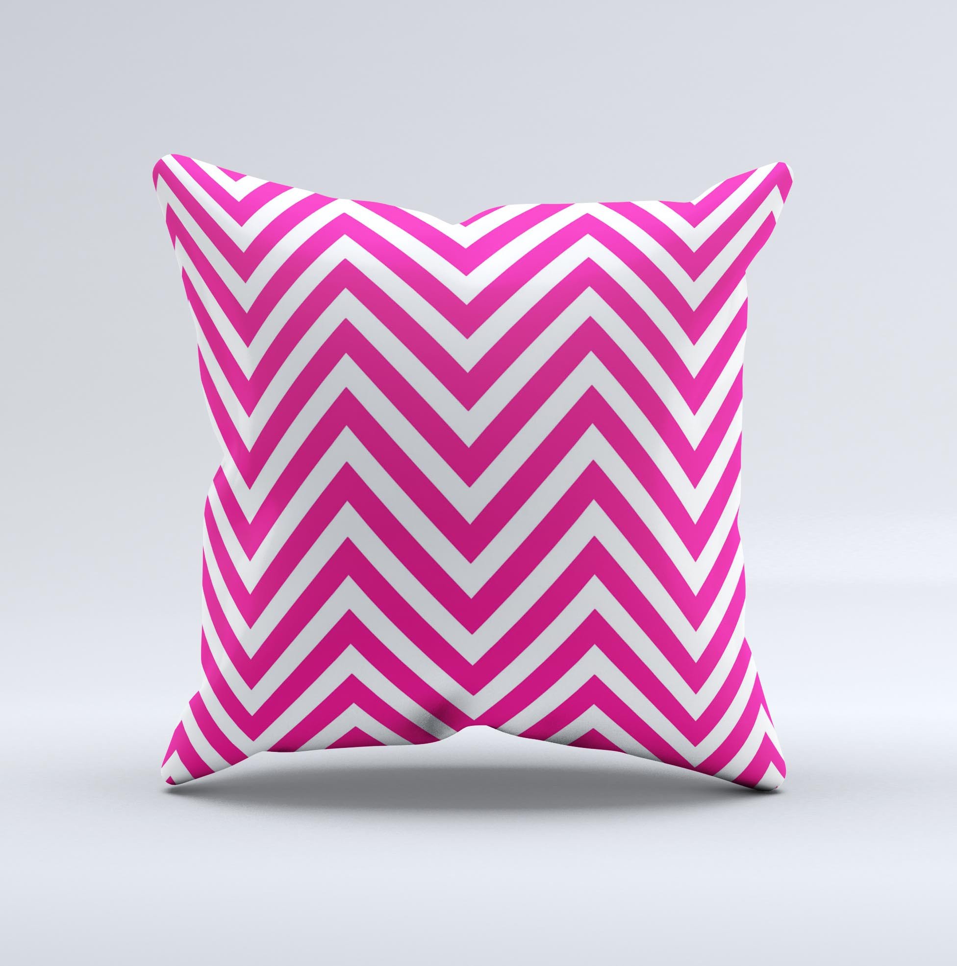 Pink and white decorative throw pillow featuring a sharp chevron pattern, handcrafted in Virginia with high-quality materials.