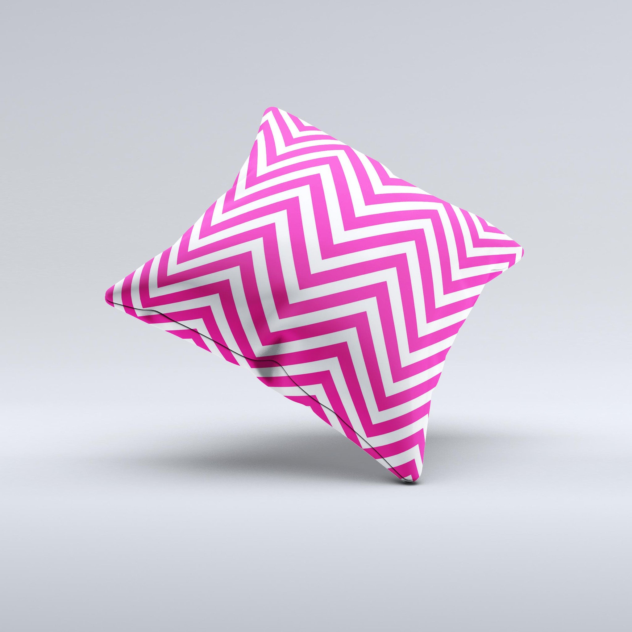 Pink and white decorative throw pillow featuring a sharp chevron pattern, handcrafted in Virginia with high-quality materials.