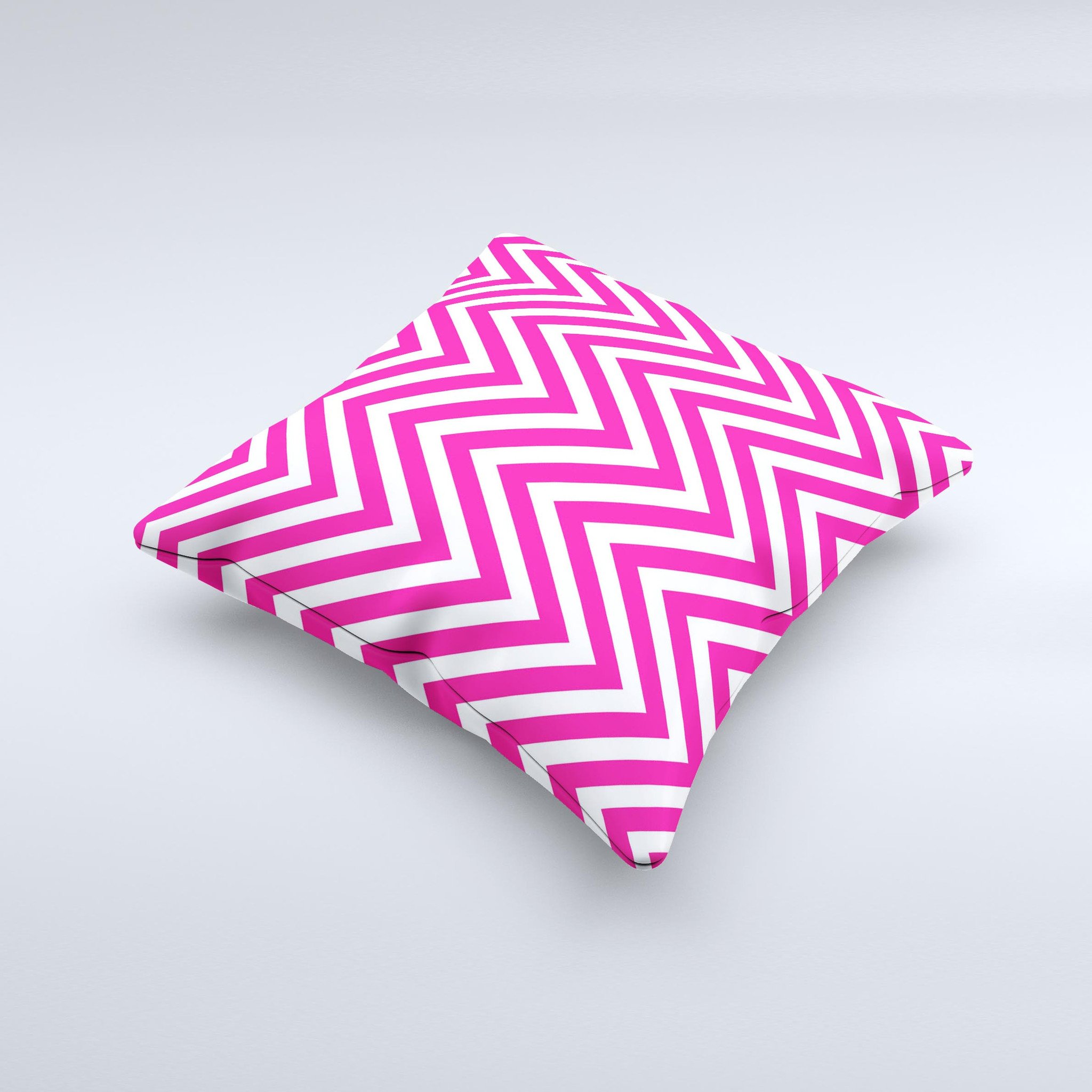 Pink and white decorative throw pillow featuring a sharp chevron pattern, handcrafted in Virginia with high-quality materials.