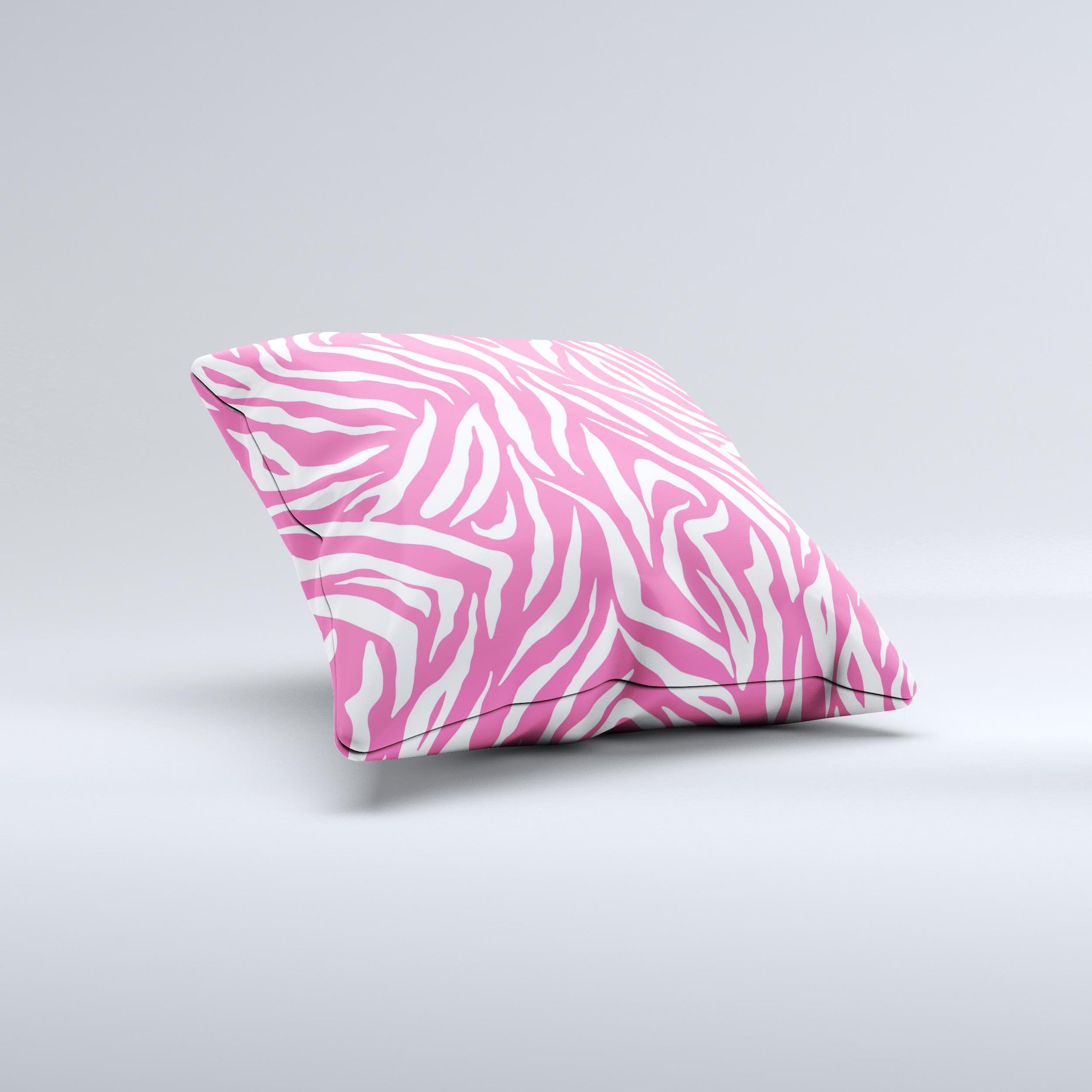 Pink and white decorative throw pillow featuring a unique zebra print design, handcrafted in Virginia with high-quality materials.