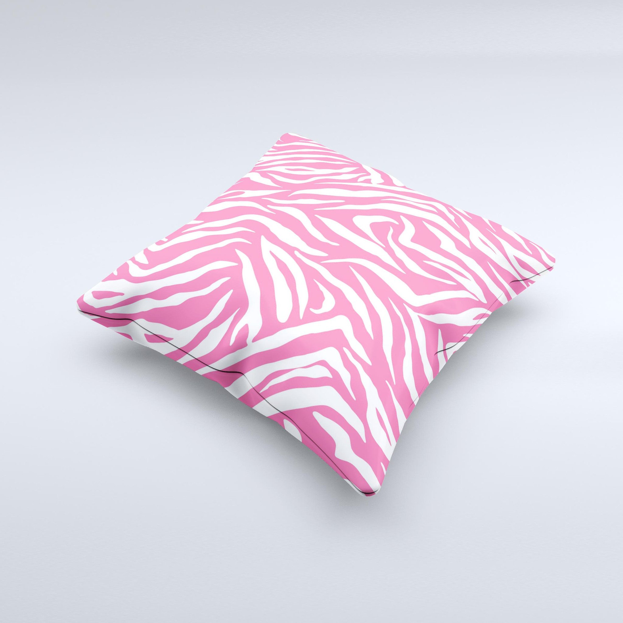 Pink and white decorative throw pillow featuring a unique zebra print design, handcrafted in Virginia with high-quality materials.