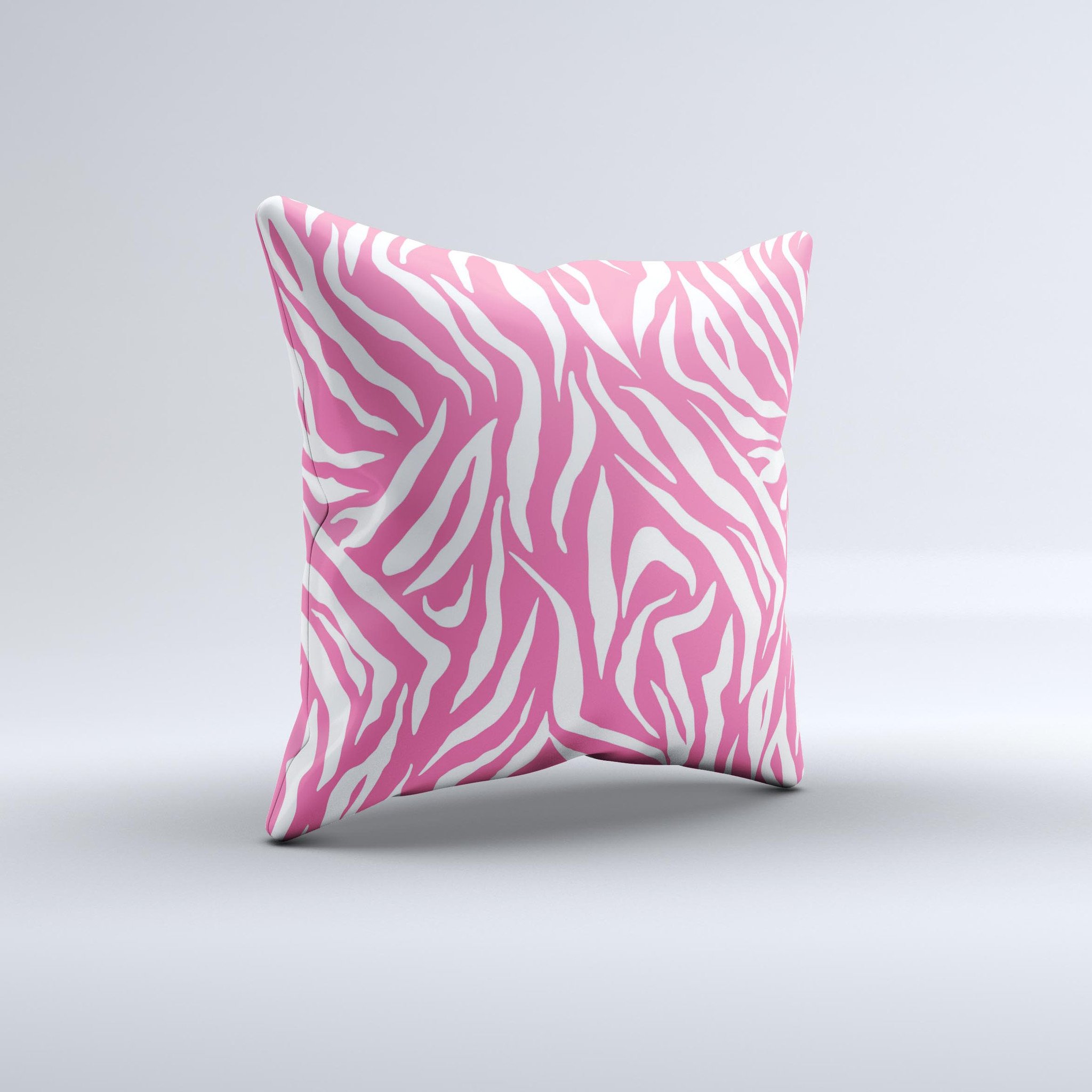 Pink and white decorative throw pillow featuring a unique zebra print design, handcrafted in Virginia with high-quality materials.