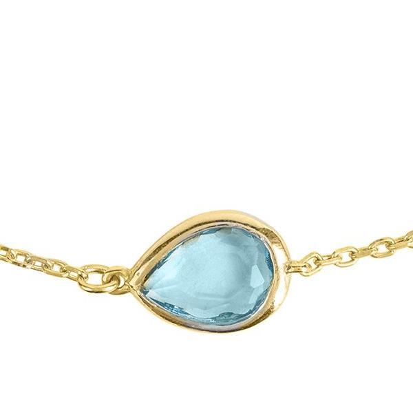 Pisa Mini Teardrop Bracelet in Gold featuring a Blue Topaz gemstone on a delicate chain, showcasing its elegant design.