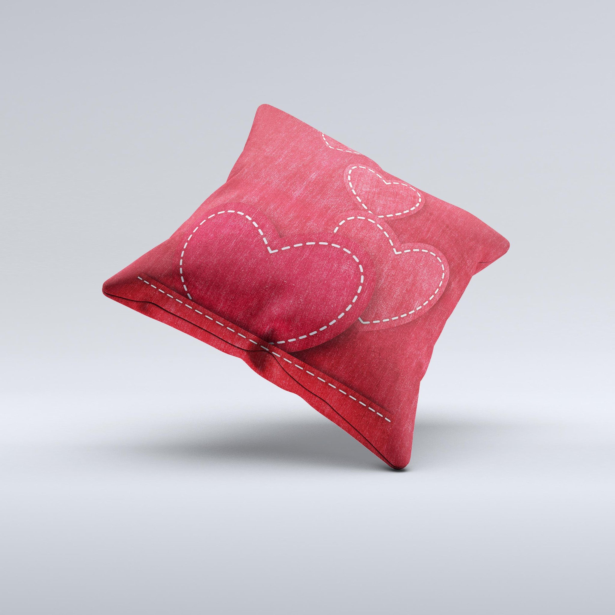 Handcrafted decorative throw pillow featuring red scratched hearts design on a soft poly/cotton fabric.