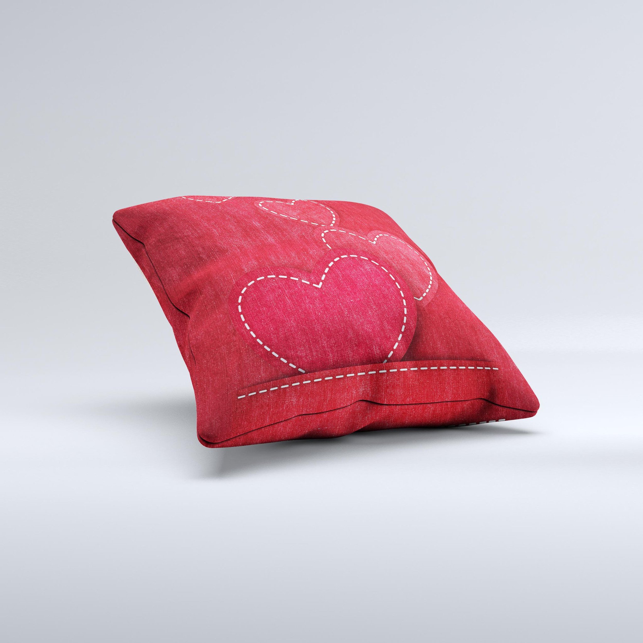 Handcrafted decorative throw pillow featuring red scratched hearts design on a soft poly/cotton fabric.