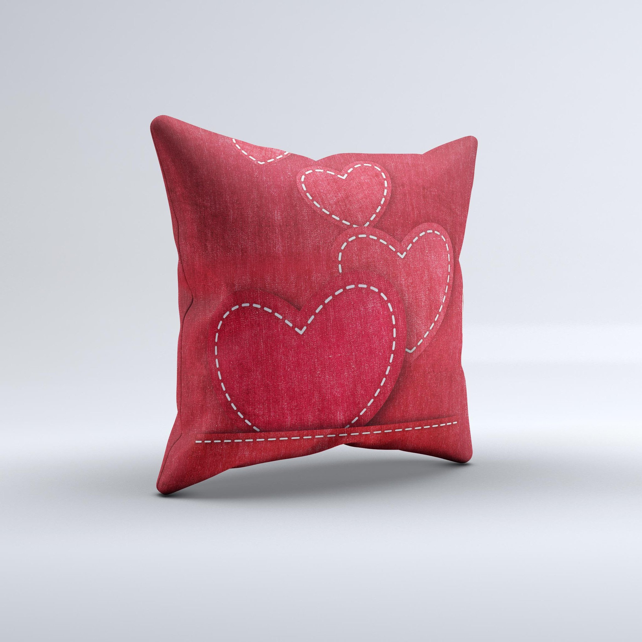 Handcrafted decorative throw pillow featuring red scratched hearts design on a soft poly/cotton fabric.