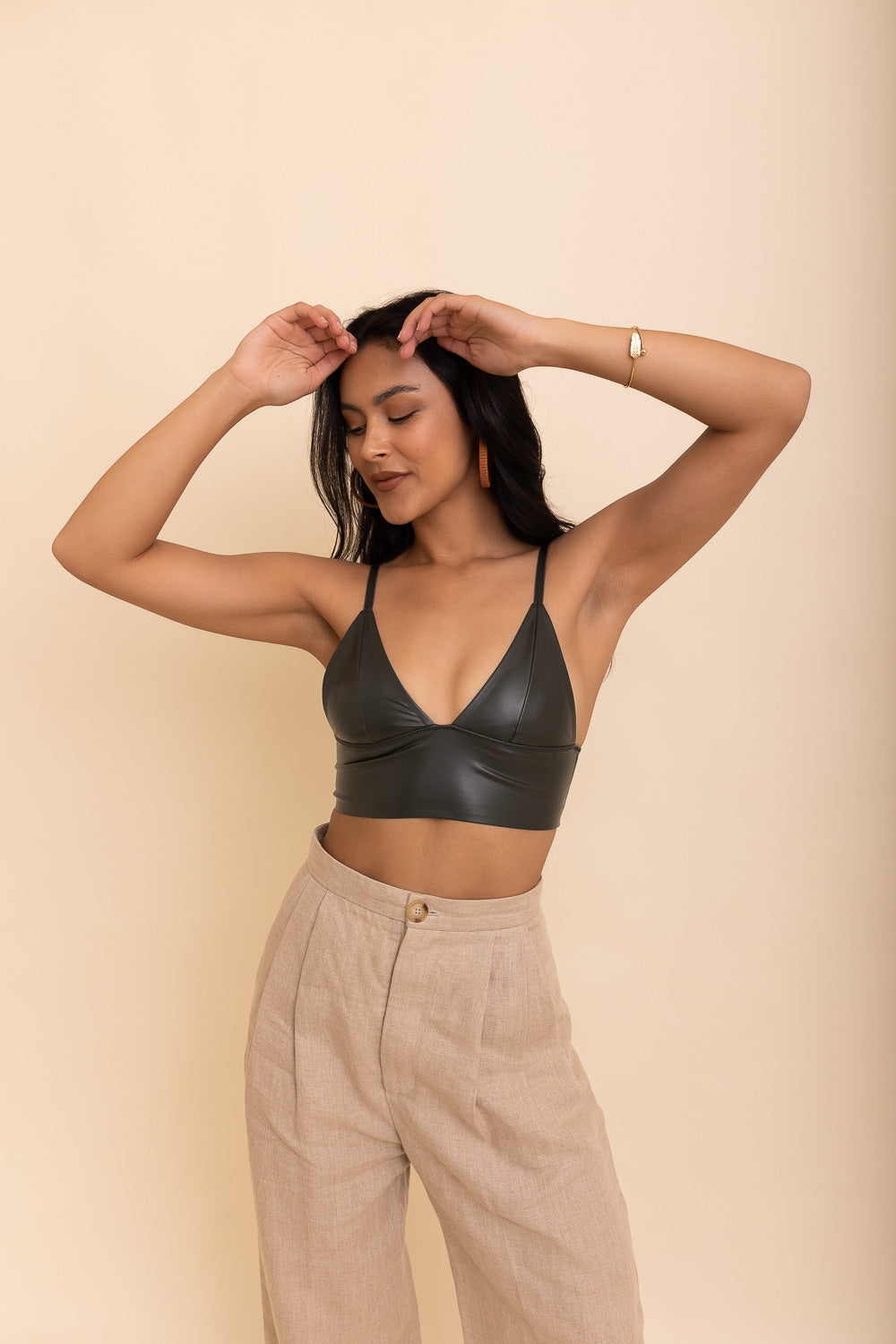 Posh Faux Leather Longline Bralette in sleek black, showcasing its stylish design and luxurious faux leather material.