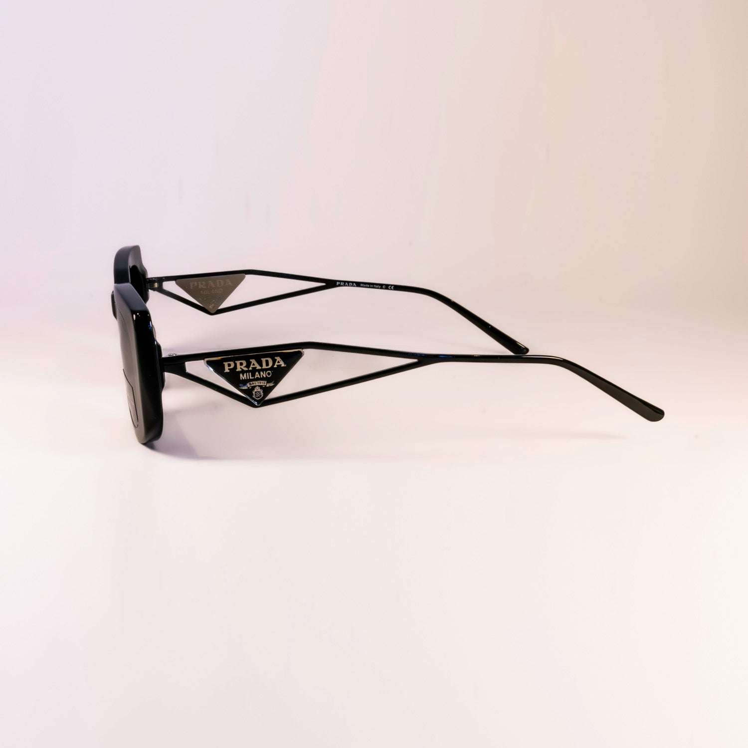 Prada PR 14YS - 1AB5S0 Sunglasses with full rim, dark grey lenses, and stylish rectangular frame.