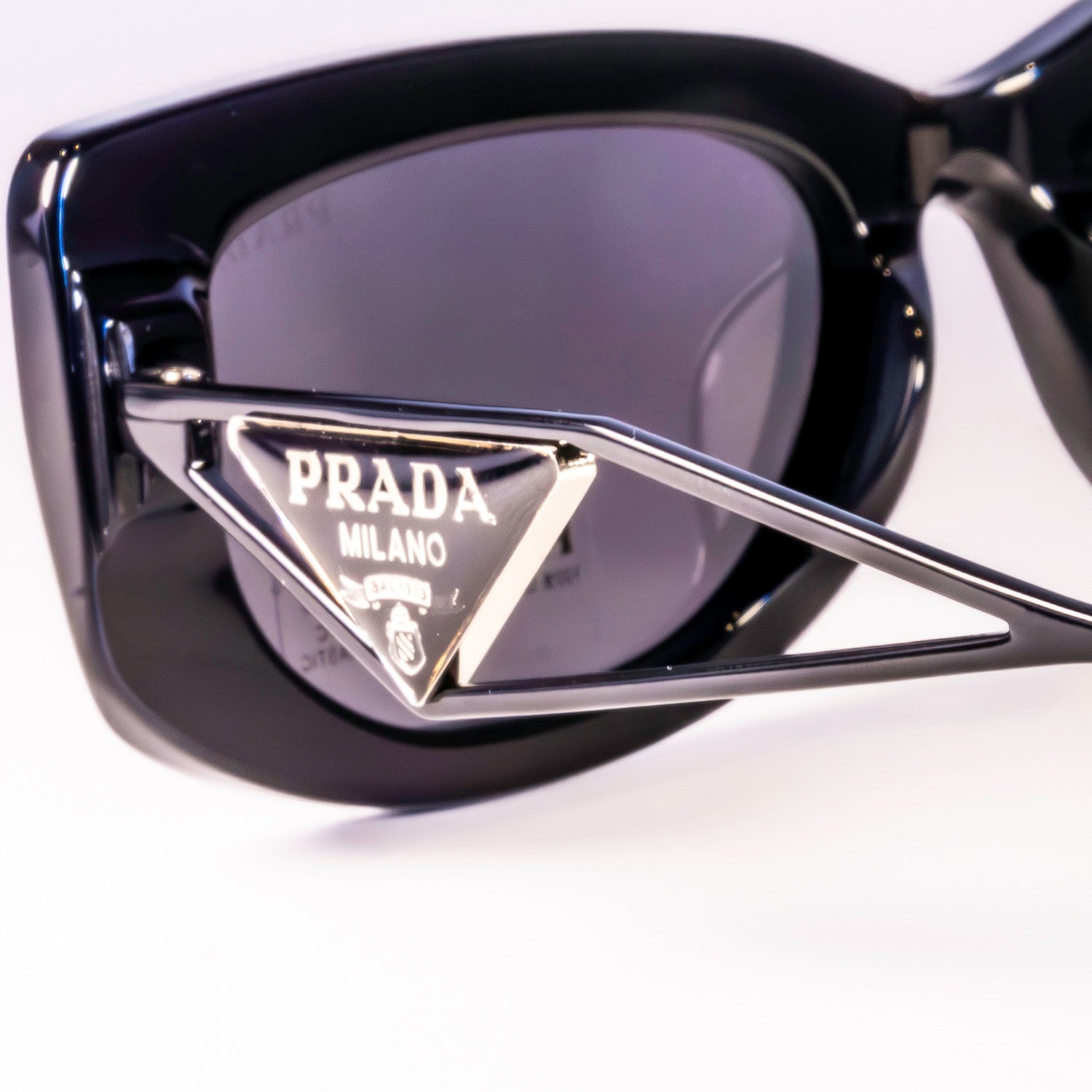 Prada PR 14YS - 1AB5S0 Sunglasses with full rim, dark grey lenses, and stylish rectangular frame.