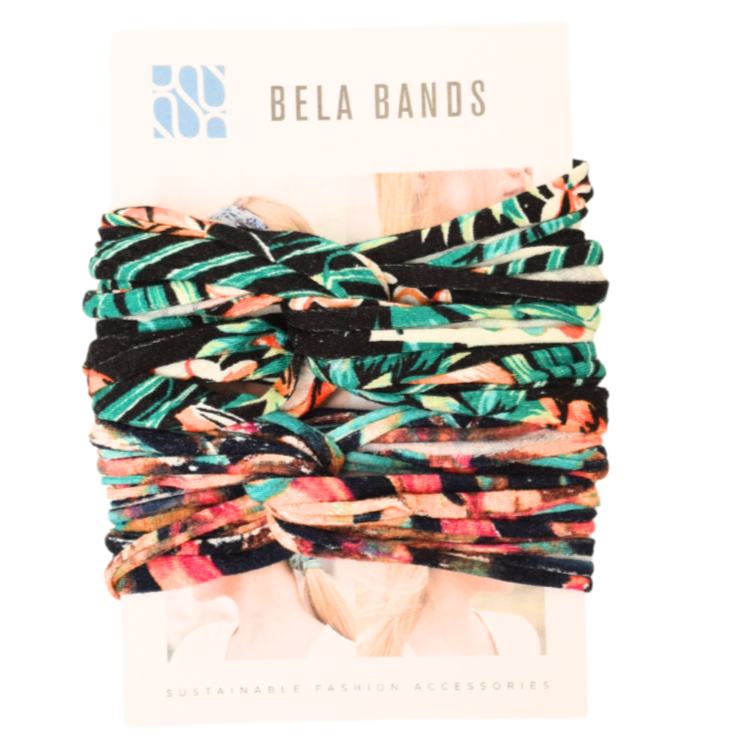 Two stylish Prints + Patterned Bela Bands in vibrant colors, showcasing their versatility as headbands and bracelets.