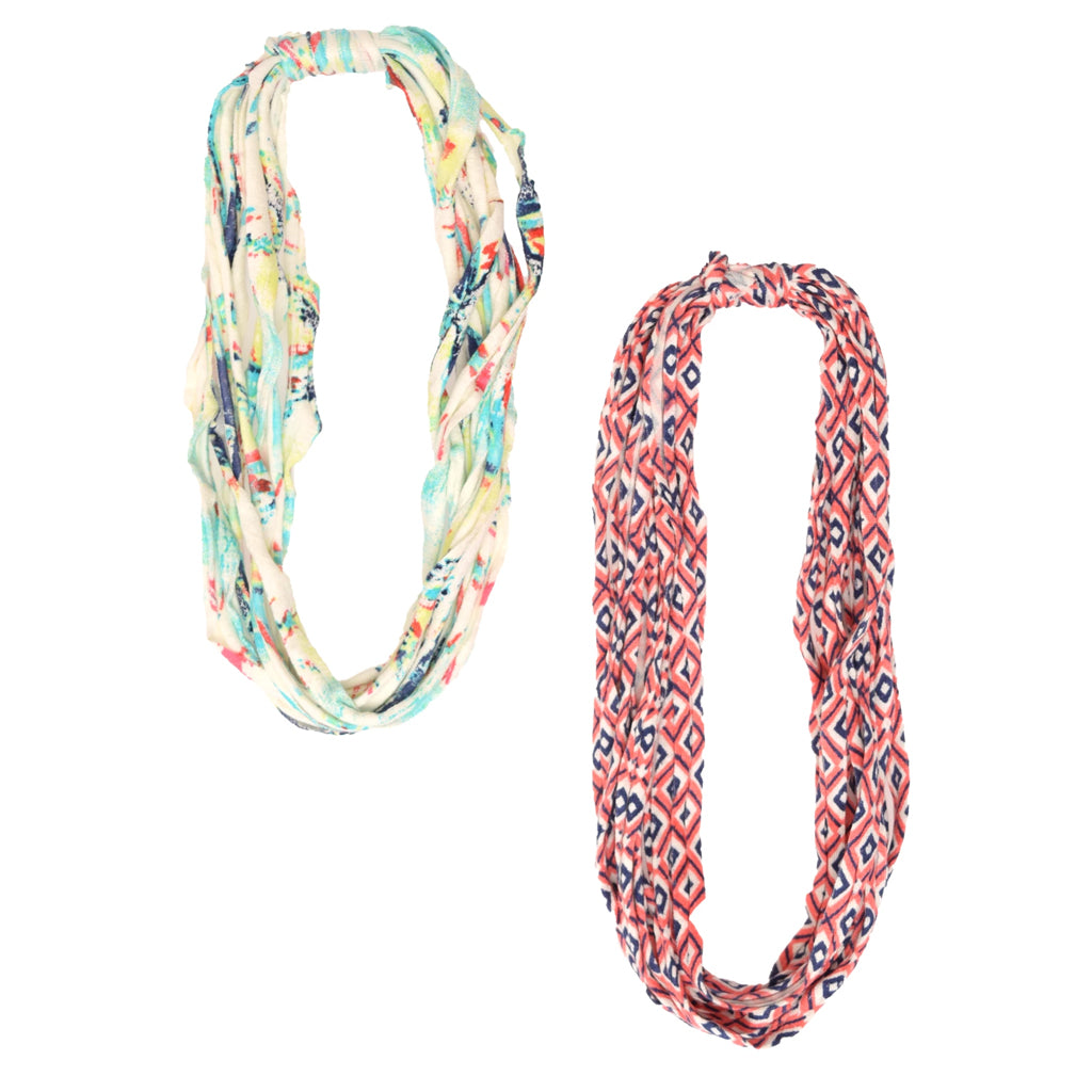 Two stylish Prints + Patterned Bela Bands in vibrant colors, showcasing their versatility as headbands and bracelets.