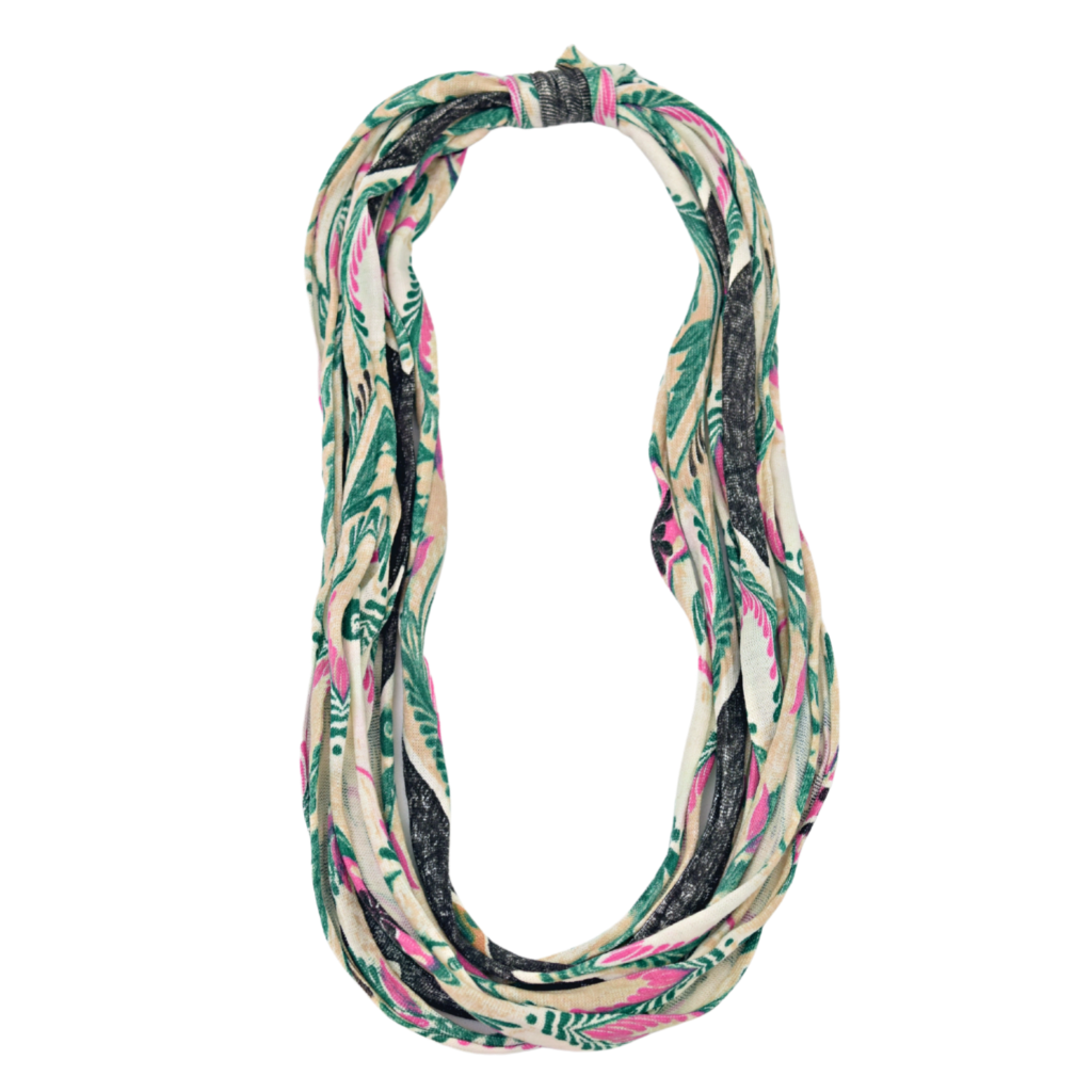 Two stylish Prints + Patterned Bela Bands in vibrant colors, showcasing their versatility as headbands and bracelets.