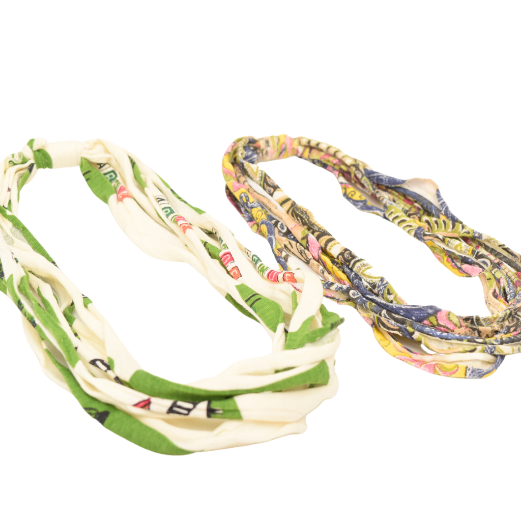 Two stylish Prints + Patterned Bela Bands in vibrant colors, showcasing their versatility as headbands and bracelets.