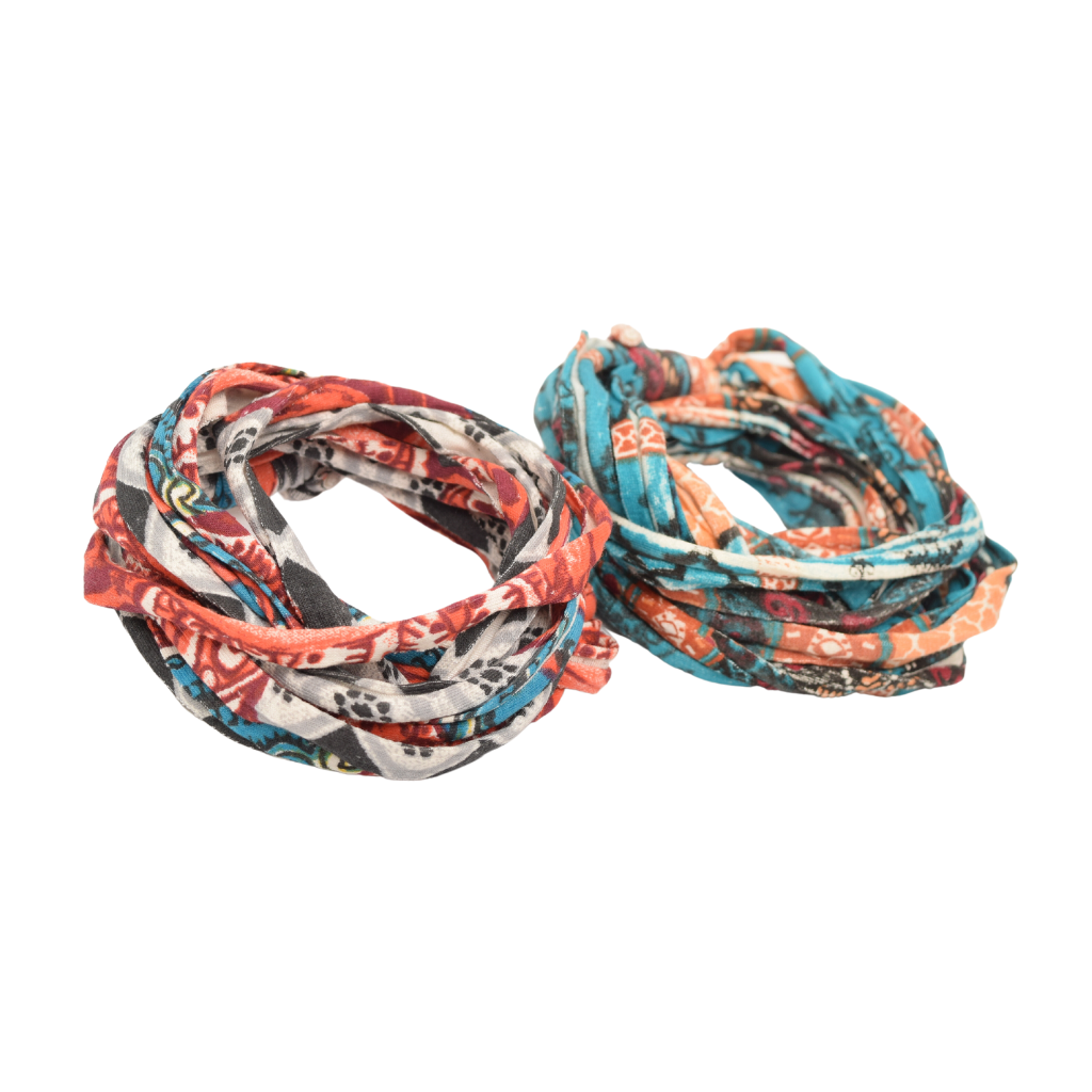 Two stylish Prints + Patterned Bela Bands in vibrant colors, showcasing their versatility as headbands and bracelets.