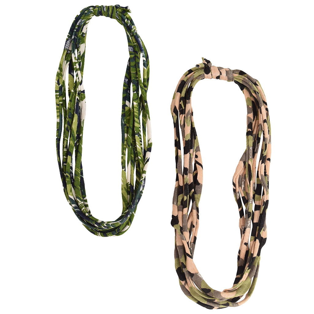 Two stylish Prints + Patterned Bela Bands in vibrant colors, showcasing their versatility as headbands and bracelets.