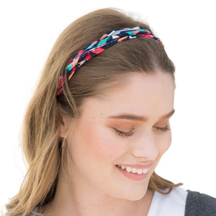 A colorful assortment of Prints + Patterns Bela Bands, showcasing their versatility as headbands and bracelets.