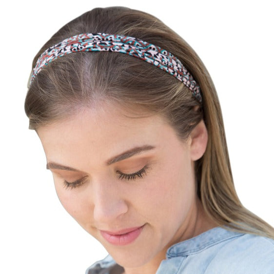 A colorful assortment of Prints + Patterns Bela Bands, showcasing their versatility as headbands and bracelets.