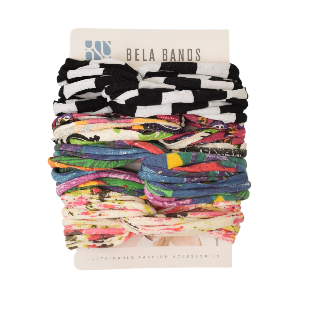 A colorful assortment of Prints + Patterns Bela Bands, showcasing their versatility as headbands and bracelets.