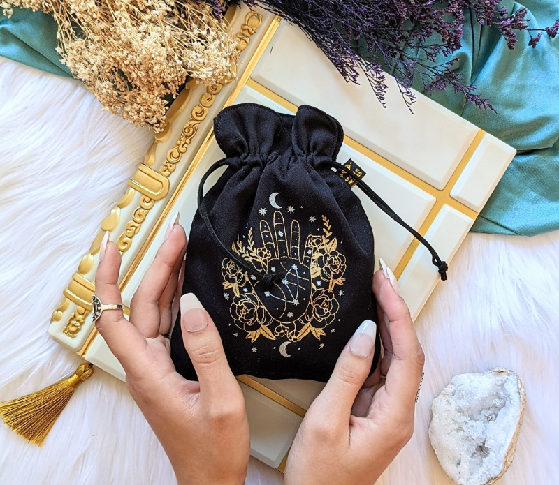 Psychic Intentions Tarot Pouch made of organic cotton with Selenite ink, featuring vegan faux suede strings, perfect for tarot card protection.