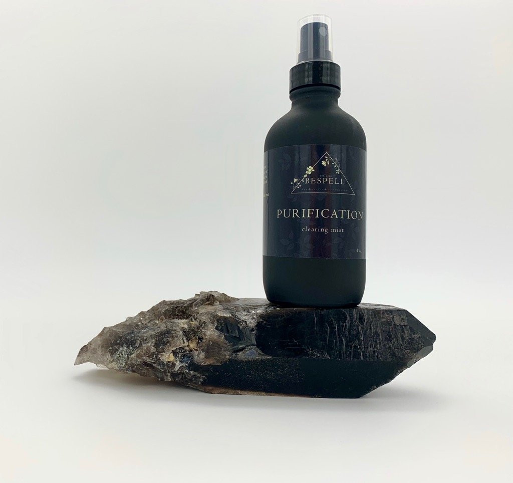 Purification Spray bottle featuring a blend of Palo Santo and Frankincense, designed for cleansing energy in any space.