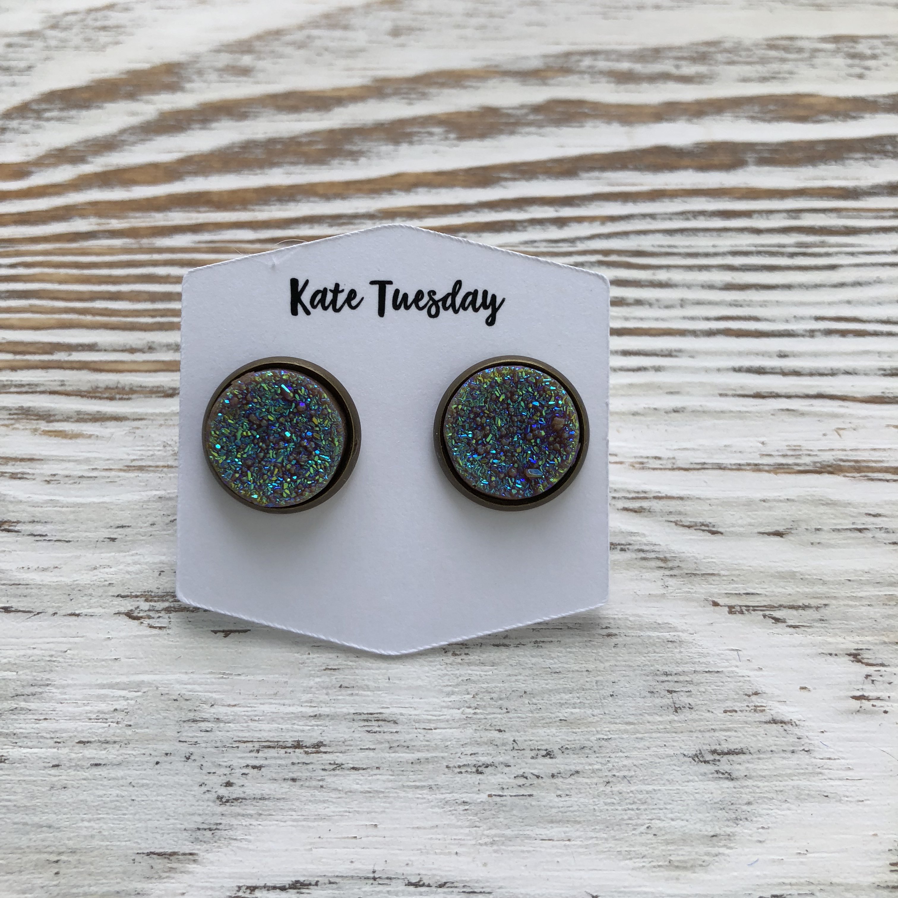 A pair of 12mm Purple Brown Sparkle Druzy Earrings with shimmering stones set in silver, bronze, gold, and rose gold options, designed for sensitive ears.