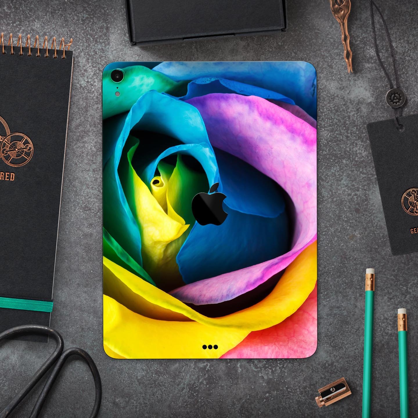 Rainbow Dyed Rose V3 skin decal for Apple iPad Pro, showcasing vibrant colors and premium 3M material for protection.