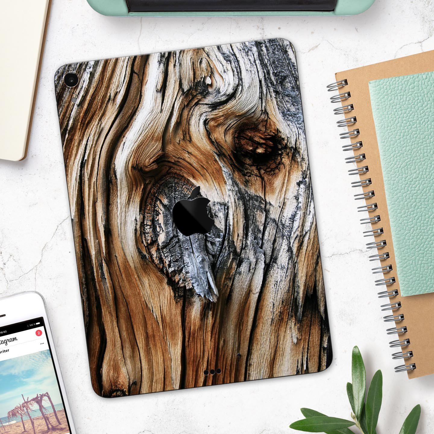 Raw Aged Knobby Wood skin decal for Apple iPad Pro, showcasing its unique wood texture and premium finish.