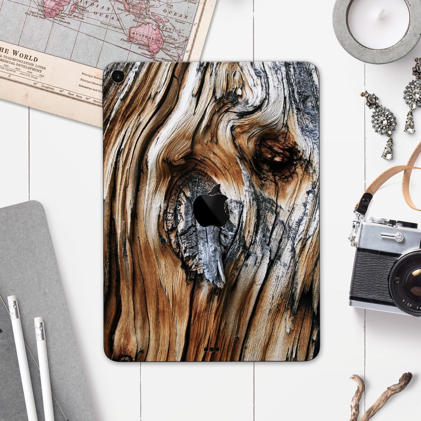 Raw Aged Knobby Wood skin decal for Apple iPad Pro, showcasing its unique wood texture and premium finish.