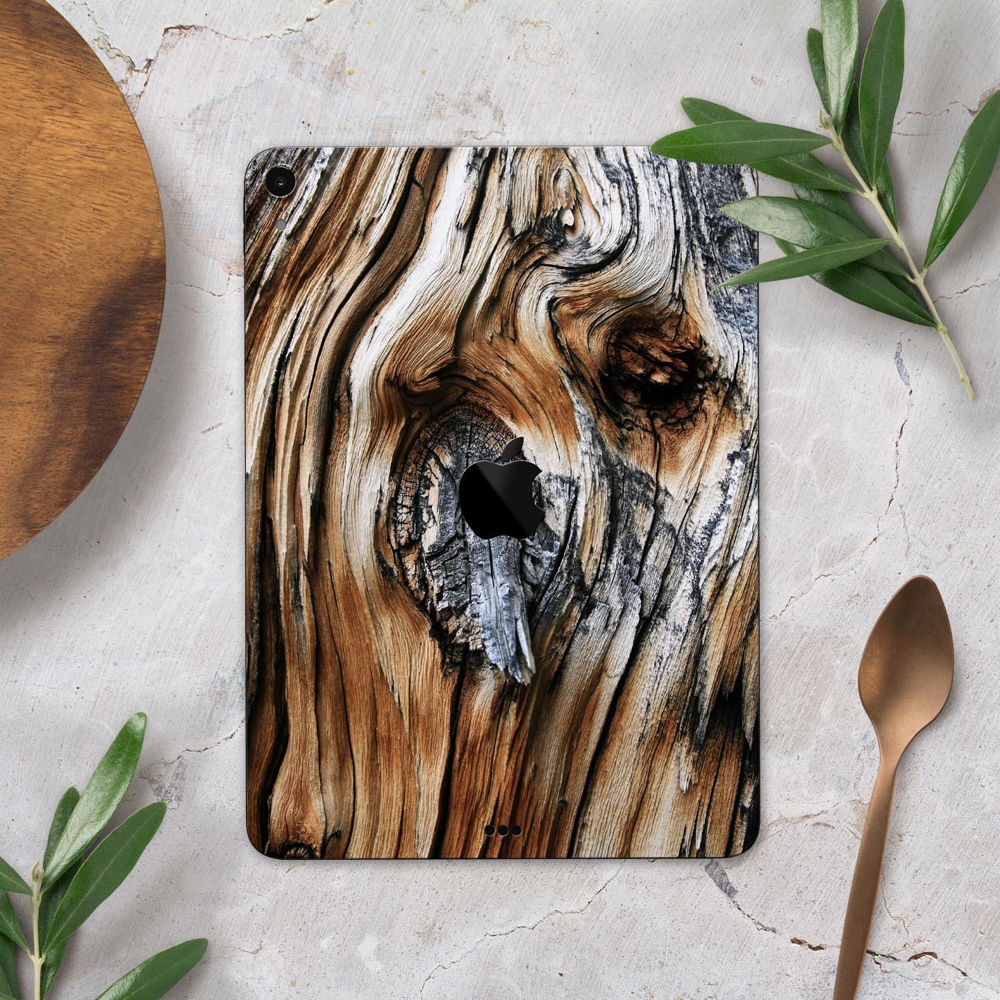 Raw Aged Knobby Wood skin decal for Apple iPad Pro, showcasing its unique wood texture and premium finish.