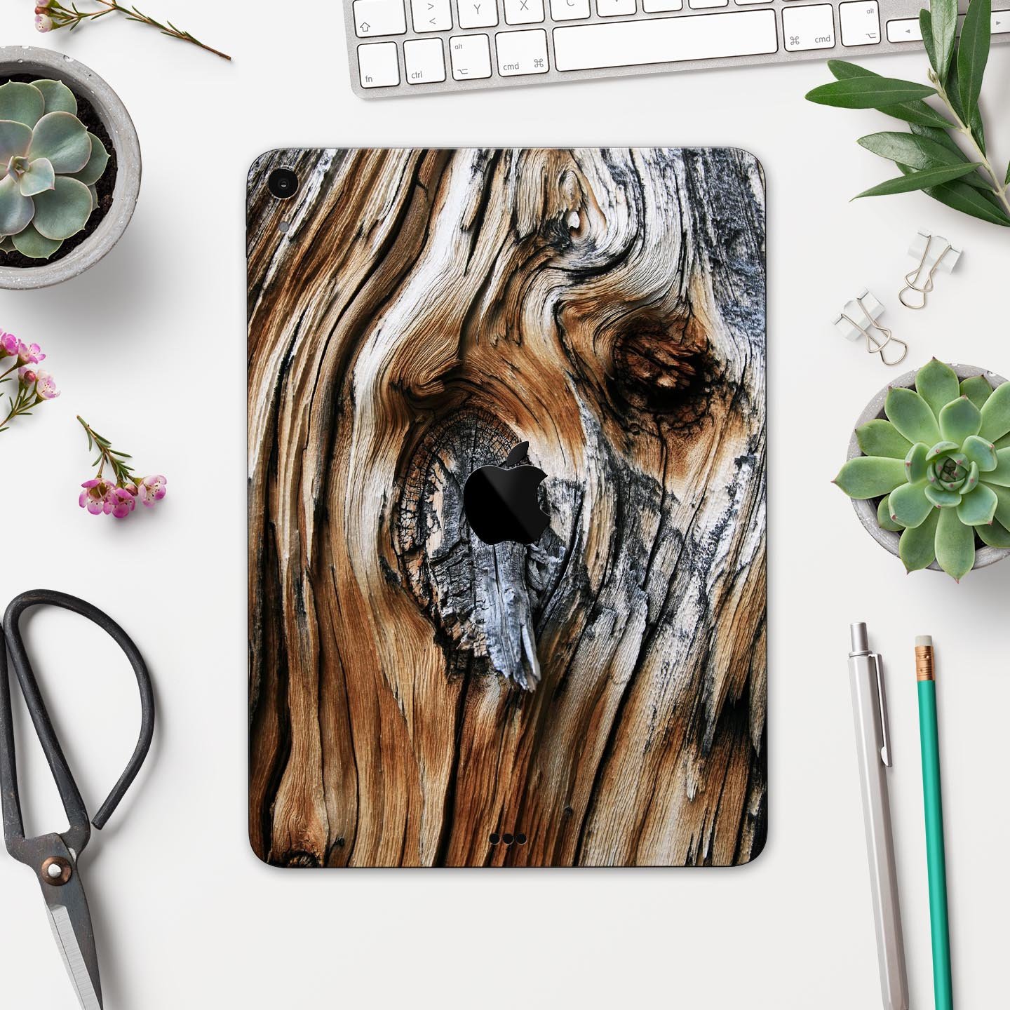 Raw Aged Knobby Wood skin decal for Apple iPad Pro, showcasing its unique wood texture and premium finish.