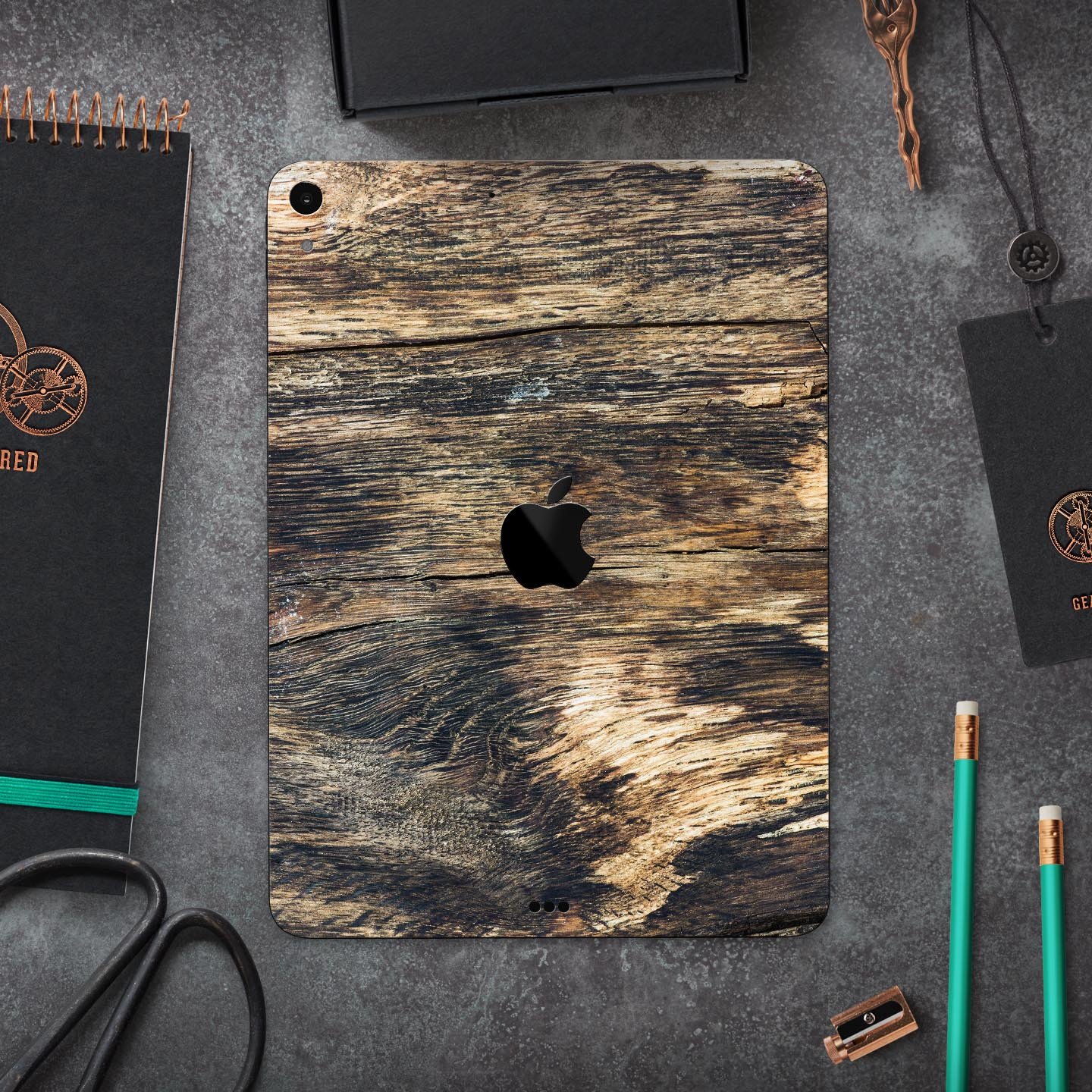 Raw Wood Planks V12 skin decal for Apple iPad Pro, showcasing a rustic wood design with a smooth finish.