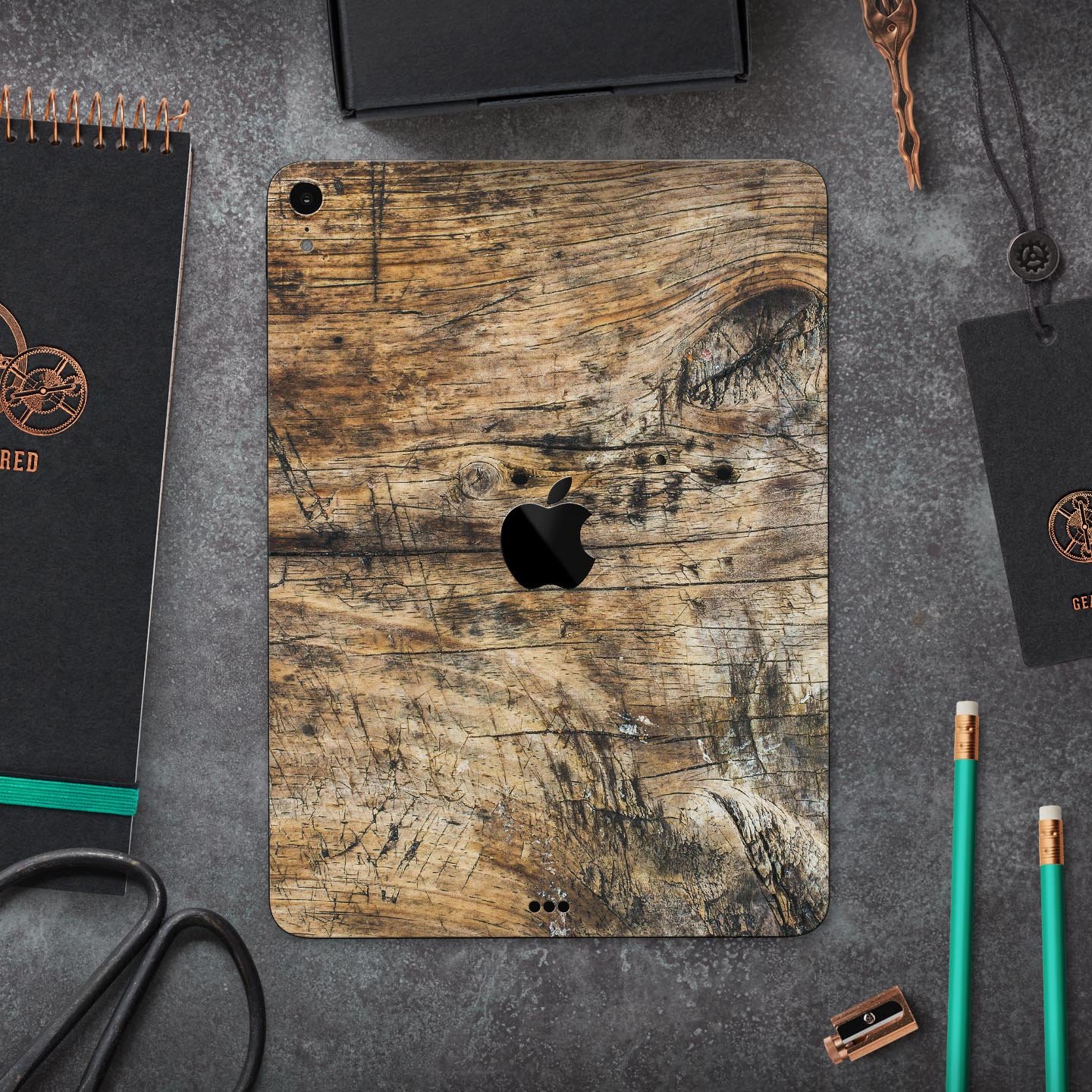 Raw Wood Planks V6 skin decal for Apple iPad Pro, showcasing a rustic wood design with a smooth finish.