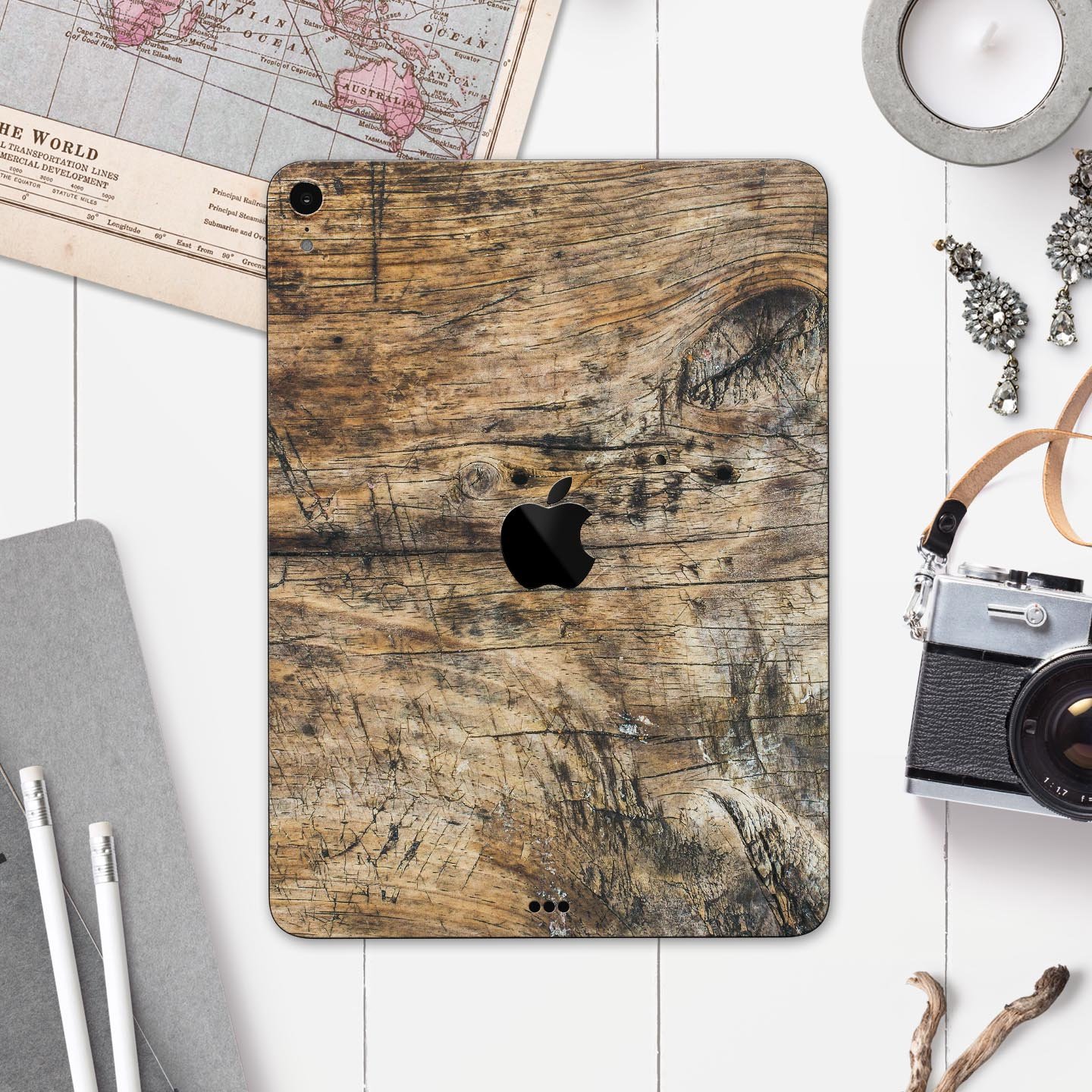 Raw Wood Planks V6 skin decal for Apple iPad Pro, showcasing a rustic wood design with a smooth finish.