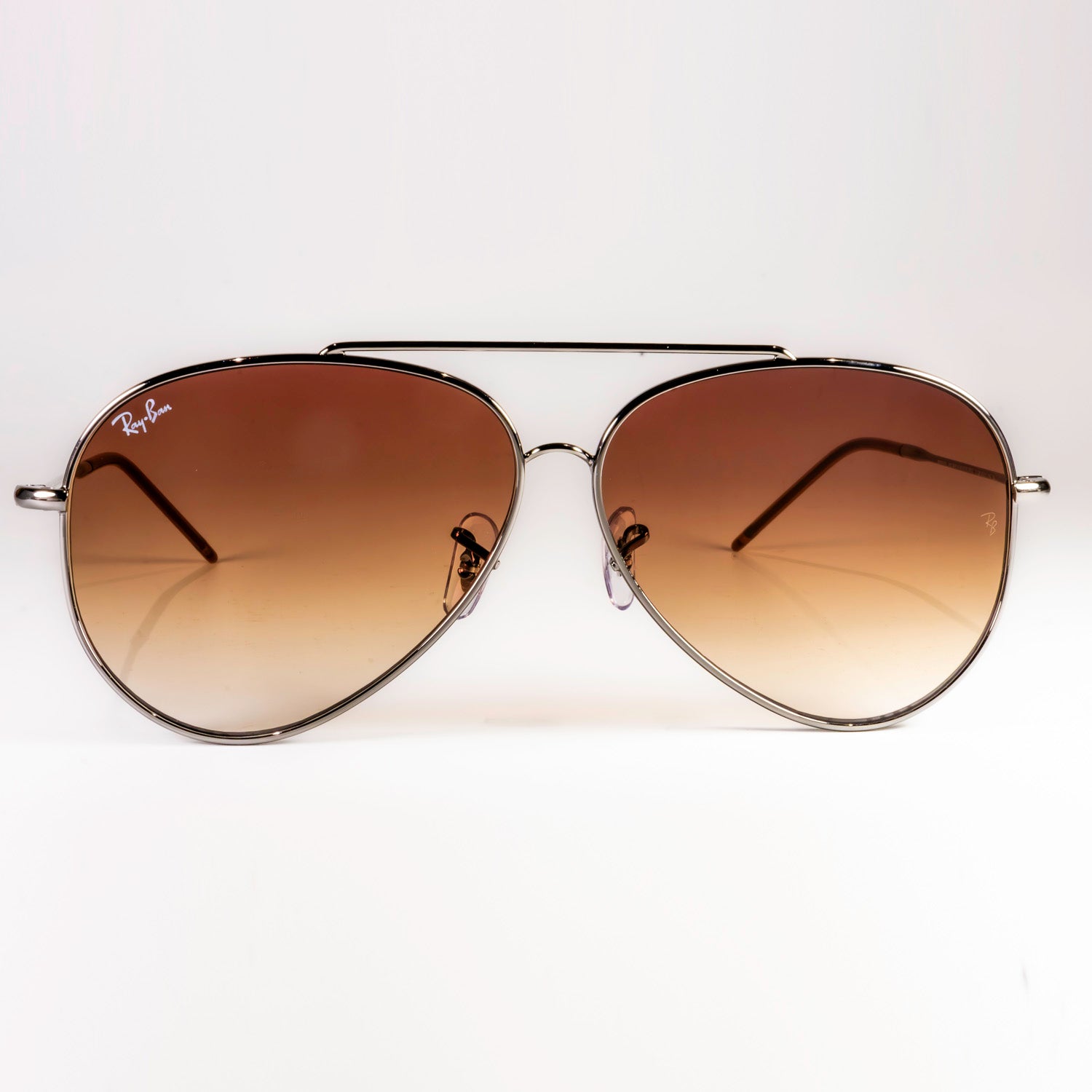 Ray-Ban RBR0101S Aviator Reverse sunglasses featuring a classic pilot shape with a sleek metal frame.