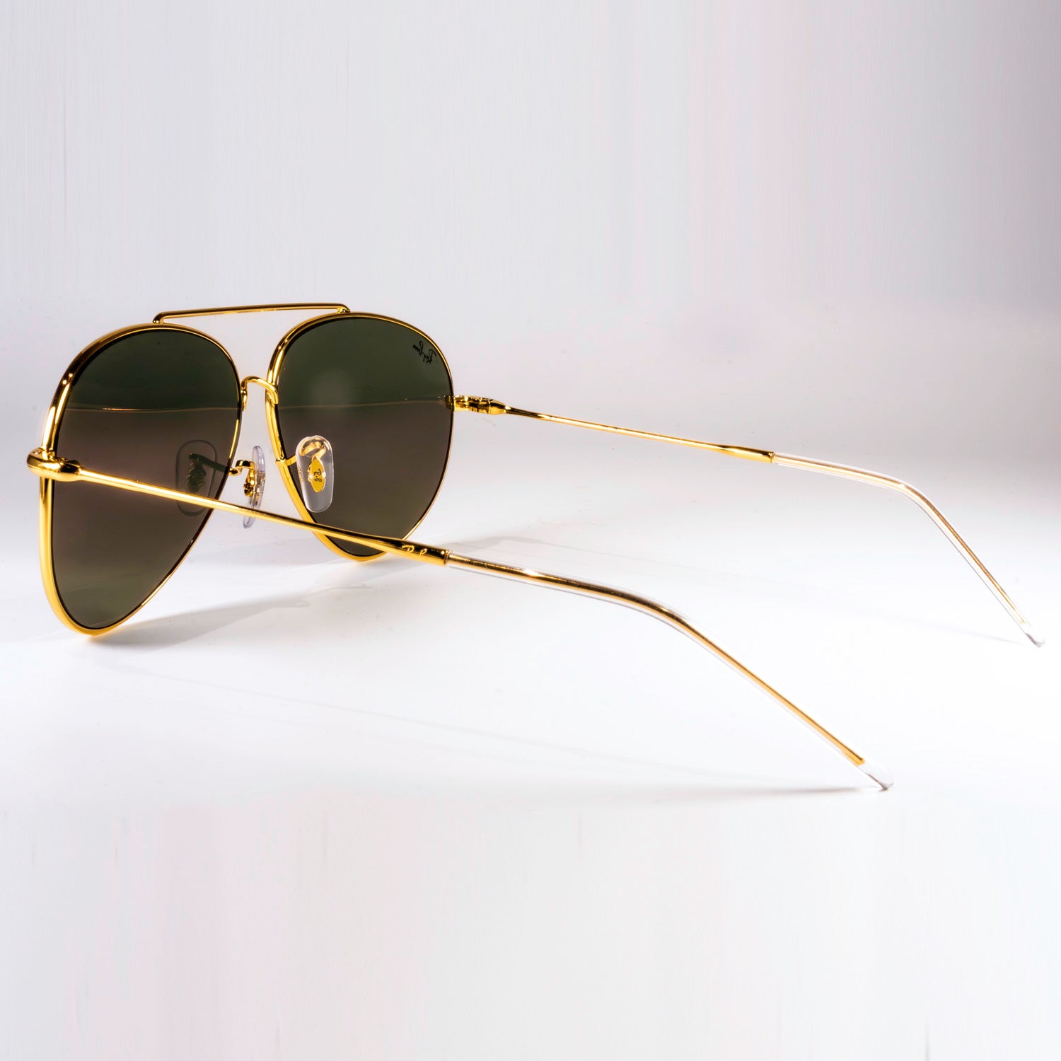 Ray-Ban RBR0101S Aviator Reverse sunglasses featuring a classic pilot shape with a sleek metal frame.